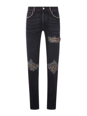 AMIRI: skinny jeans - Skinny Jeans With Studs And Destroy Details