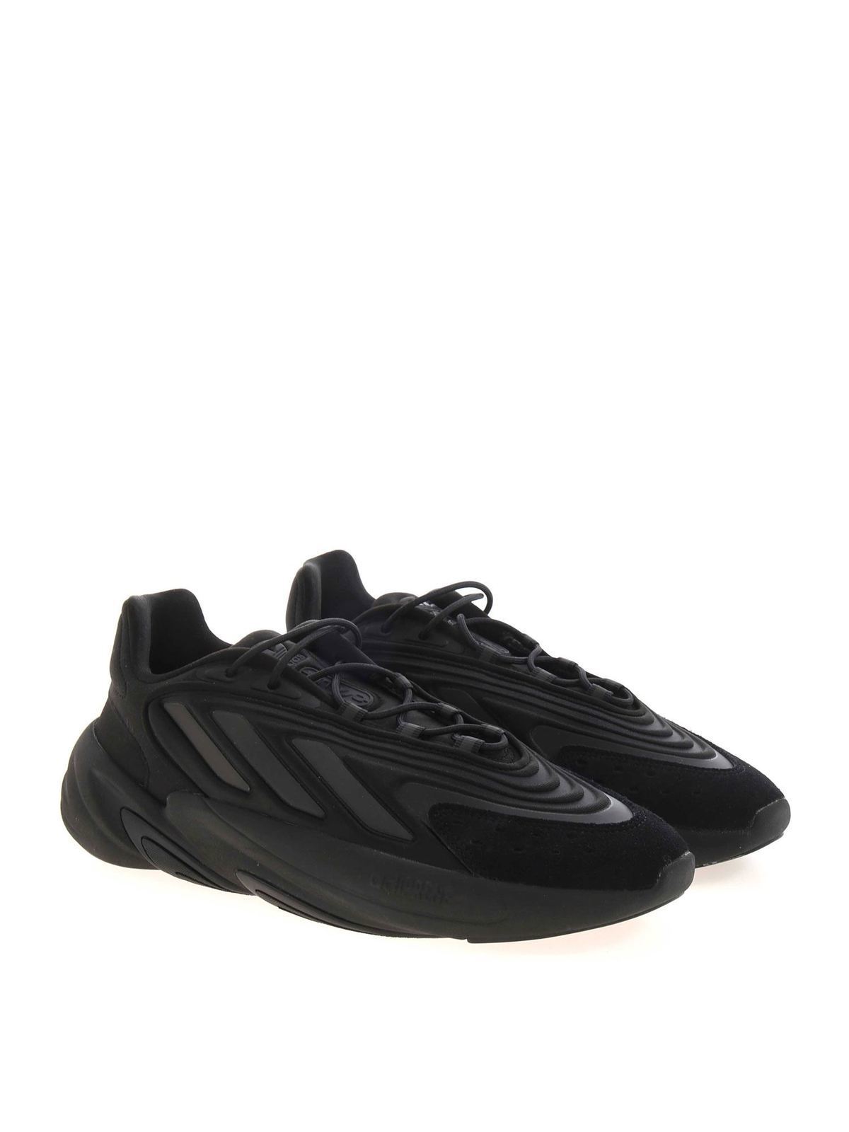 Shop Adidas Originals Ozelia Sneakers In Black