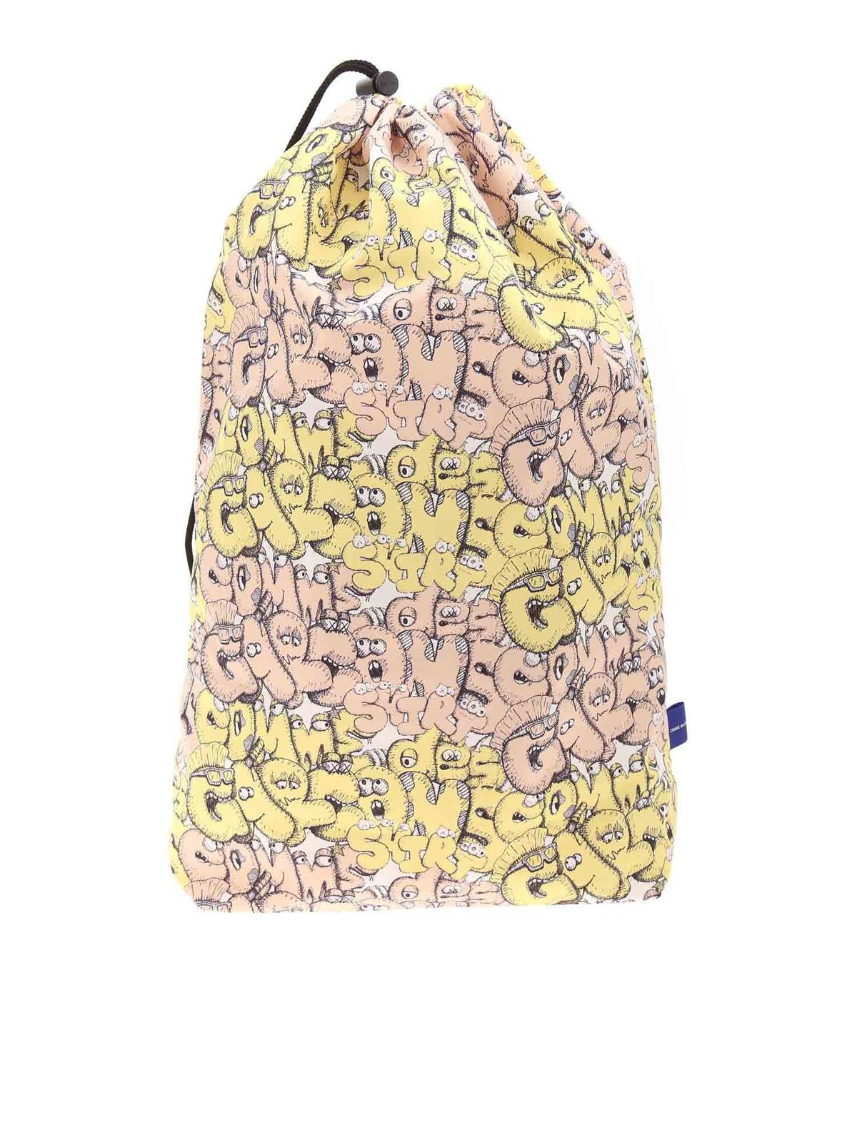 Shop Comme Des Garçons Shirt Kaws Backpack In Yellow