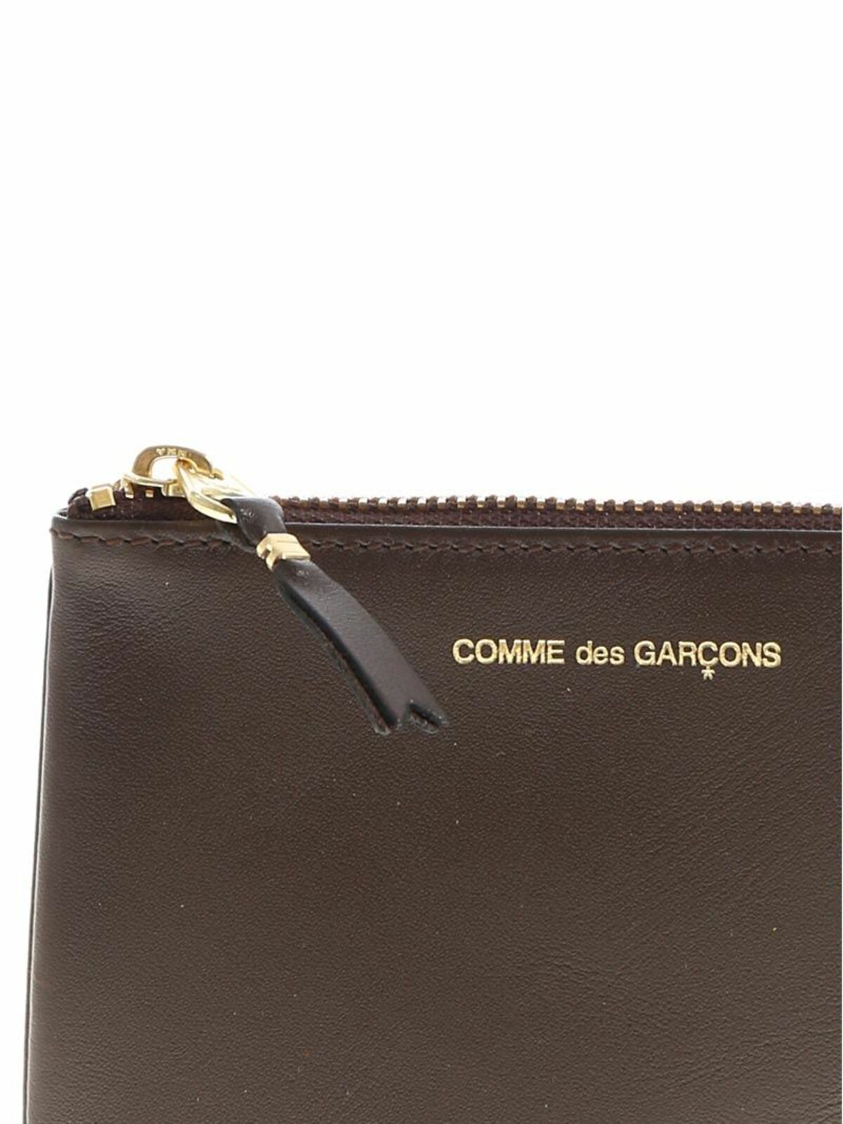 Shop Comme Des Garçons Brown Leather Purse With Logo Print