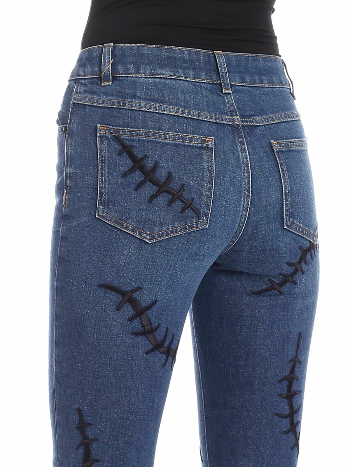 Shop Moschino Scars Jeans In Blue In Azul