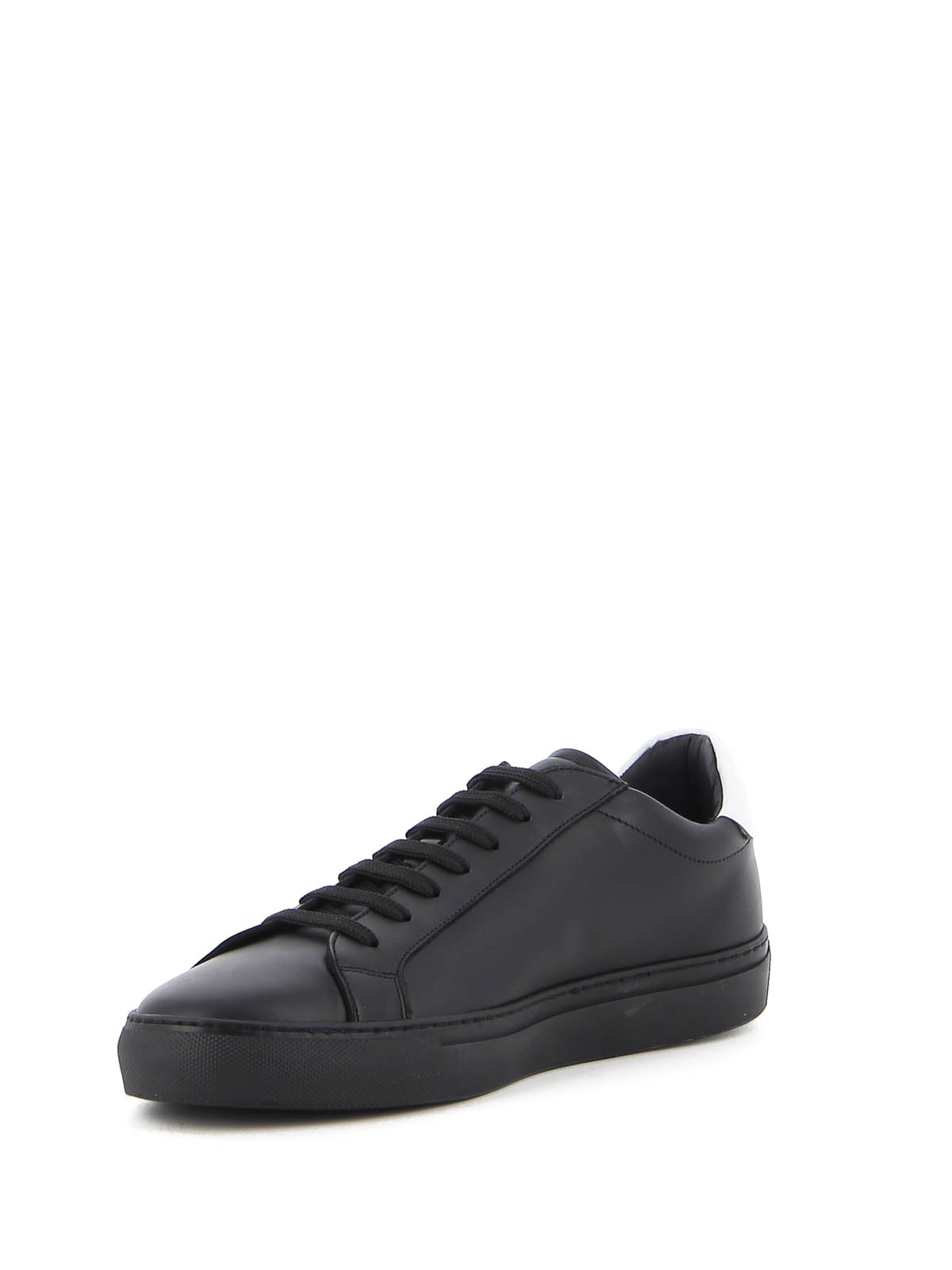 Shop Moschino Label Leather Sneakers In Black