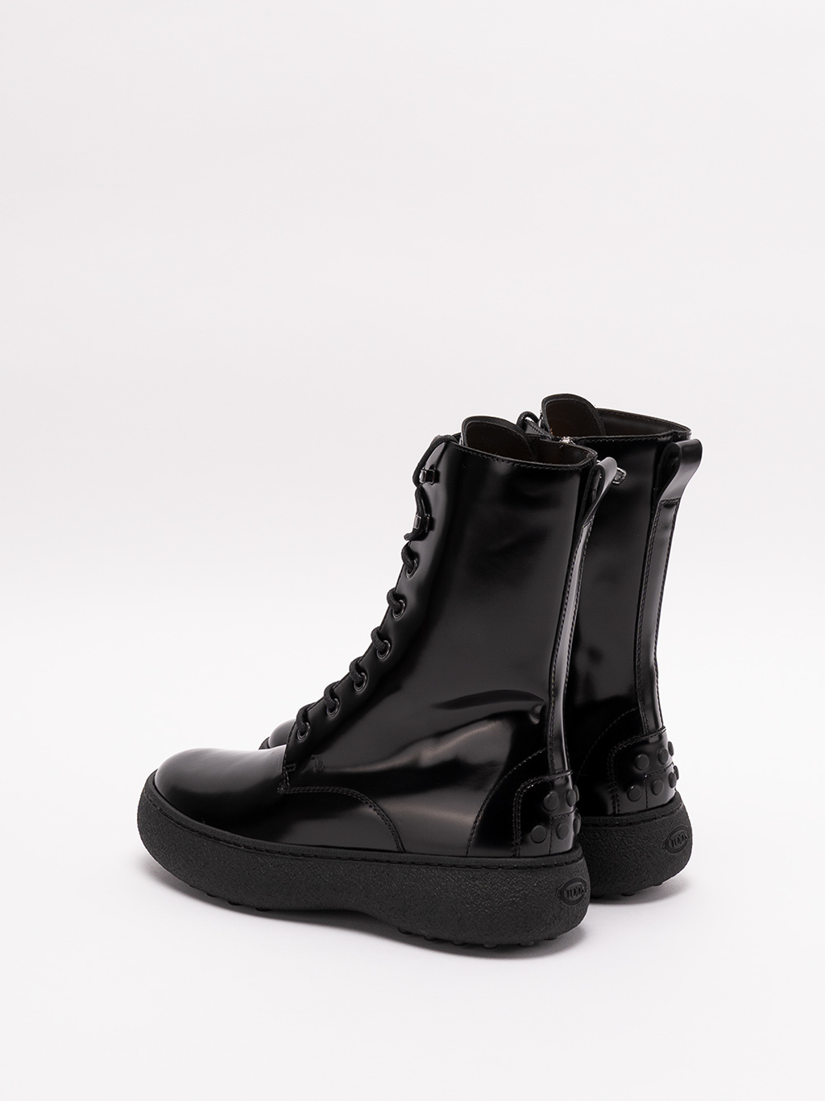 Shop Tod's Winter Gommini Ankle Boots In Negro
