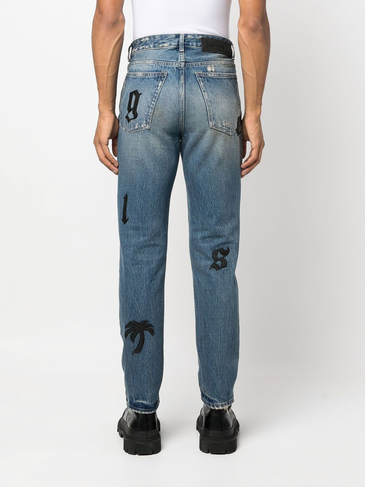 Palm Angels Skinny jeans with leather patches