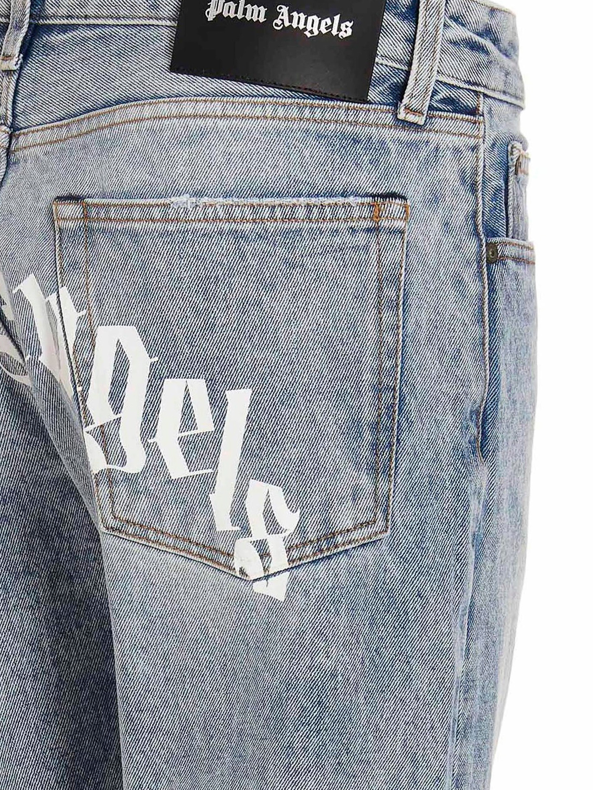 Shop Palm Angels Curved Logo Cotton Denim Jeans In Lavado Claro