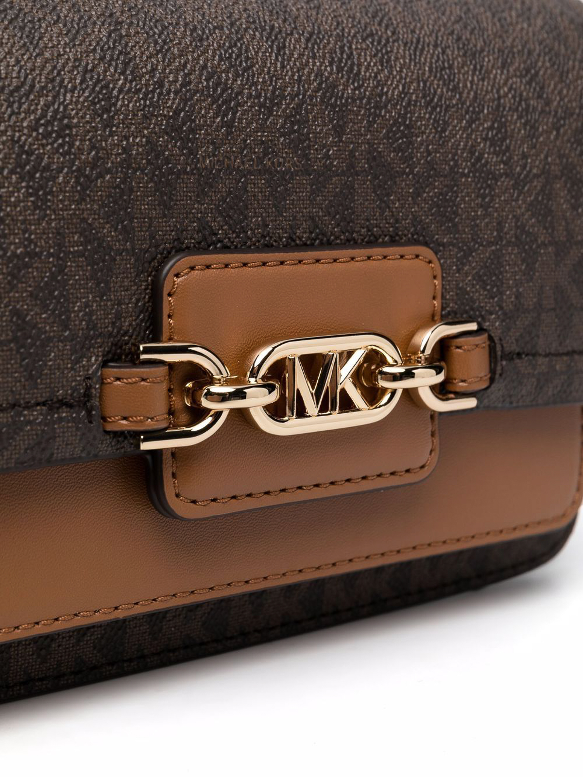 Shop Michael Kors Heather Monogram Bag With Flap Closure In Brown