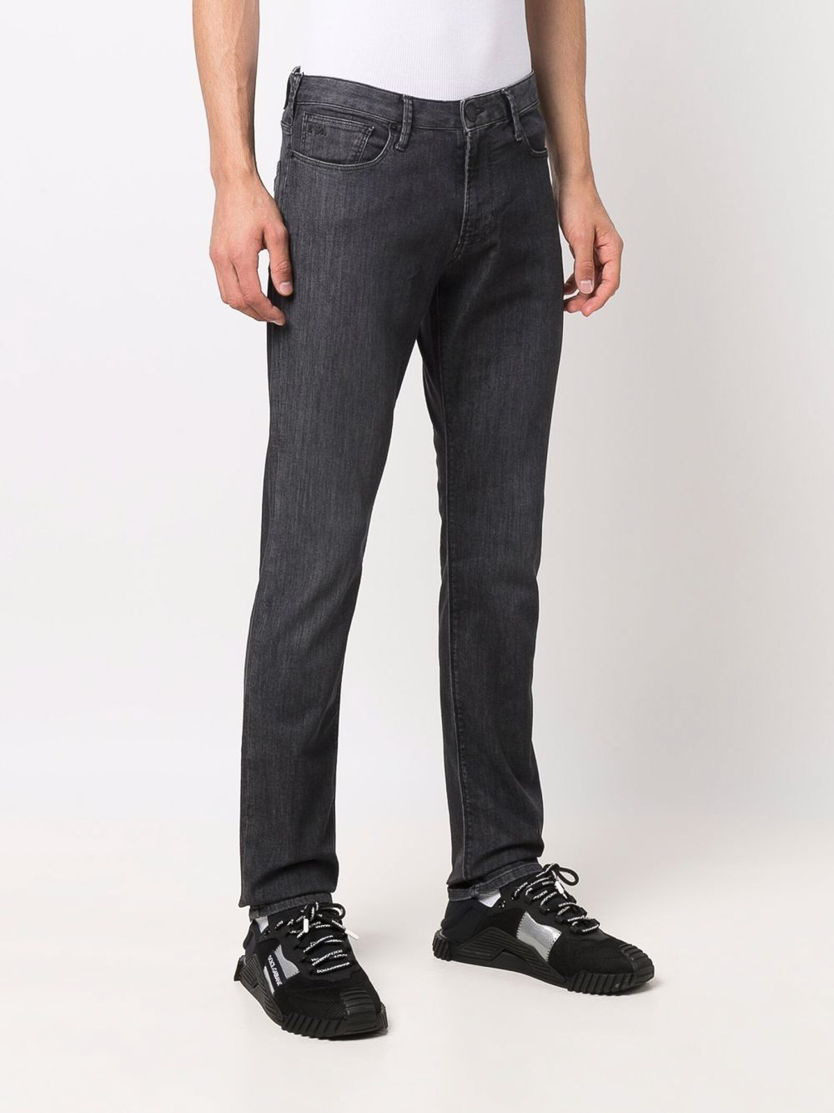 Shop Emporio Armani Faded Stretch-cotton Jeans With Logo Patch In Black