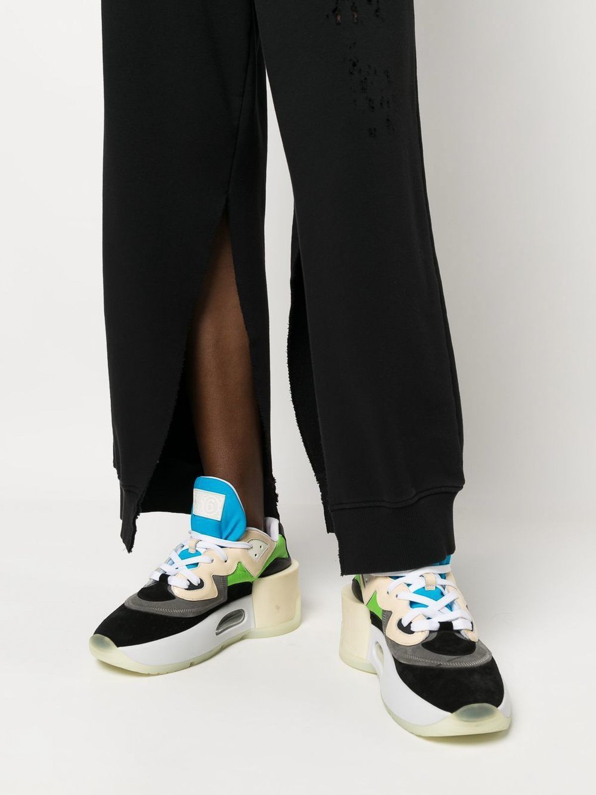 MM6 Maison Margiela Distressed track pants | S62KB0168S25454900