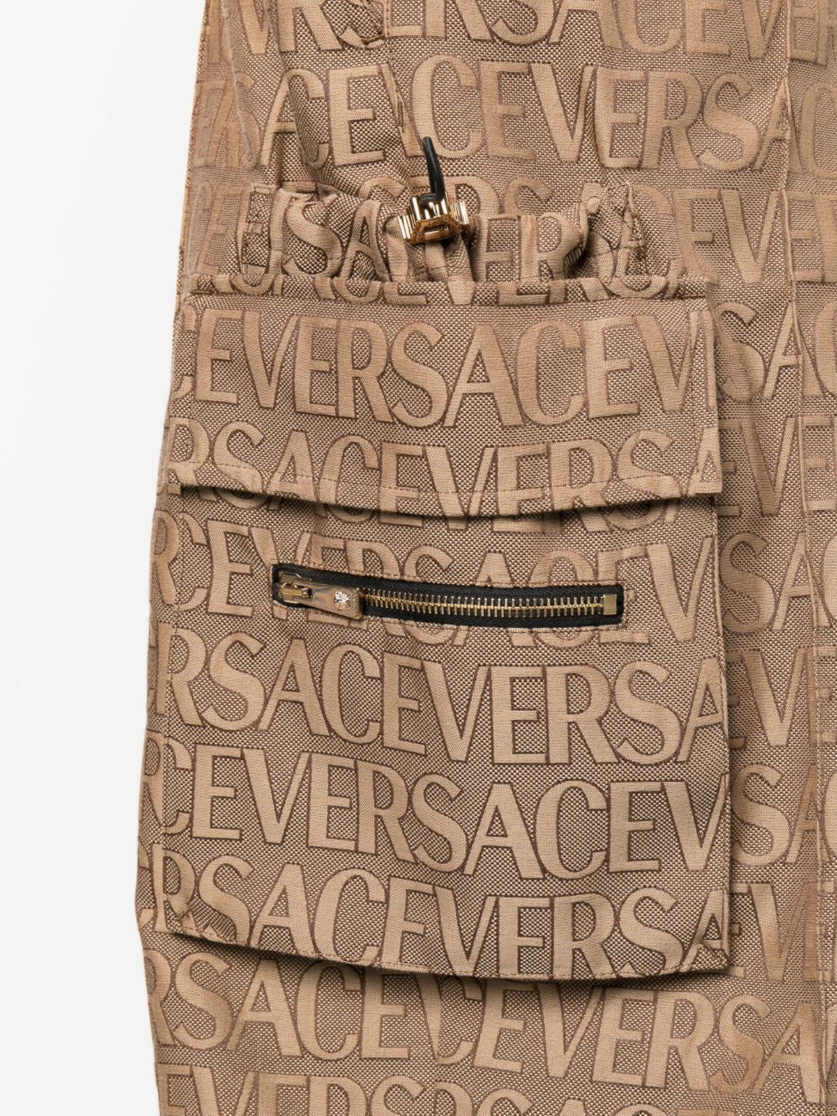 Shop Versace Allover Logo Cargo Trousers In Brown