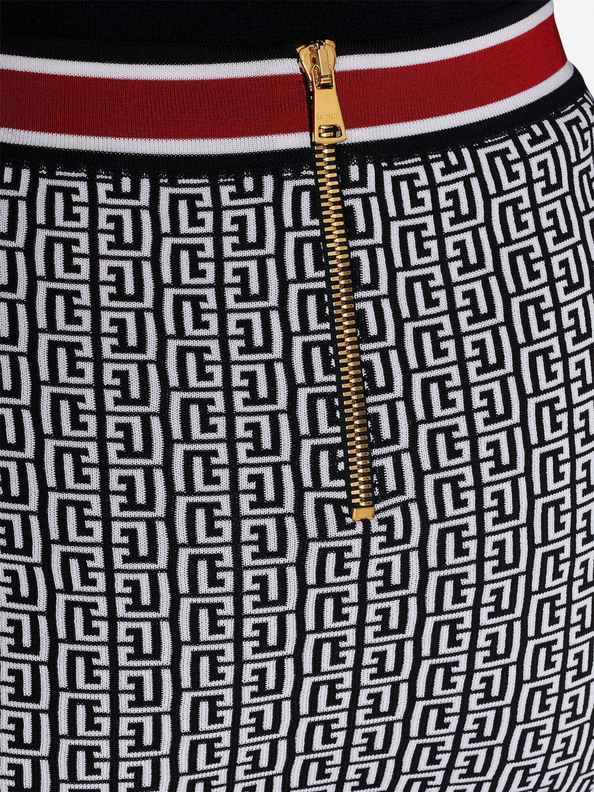 Shop Balmain Buttoned Monogram Knit Mini Skirt In Multicolor
