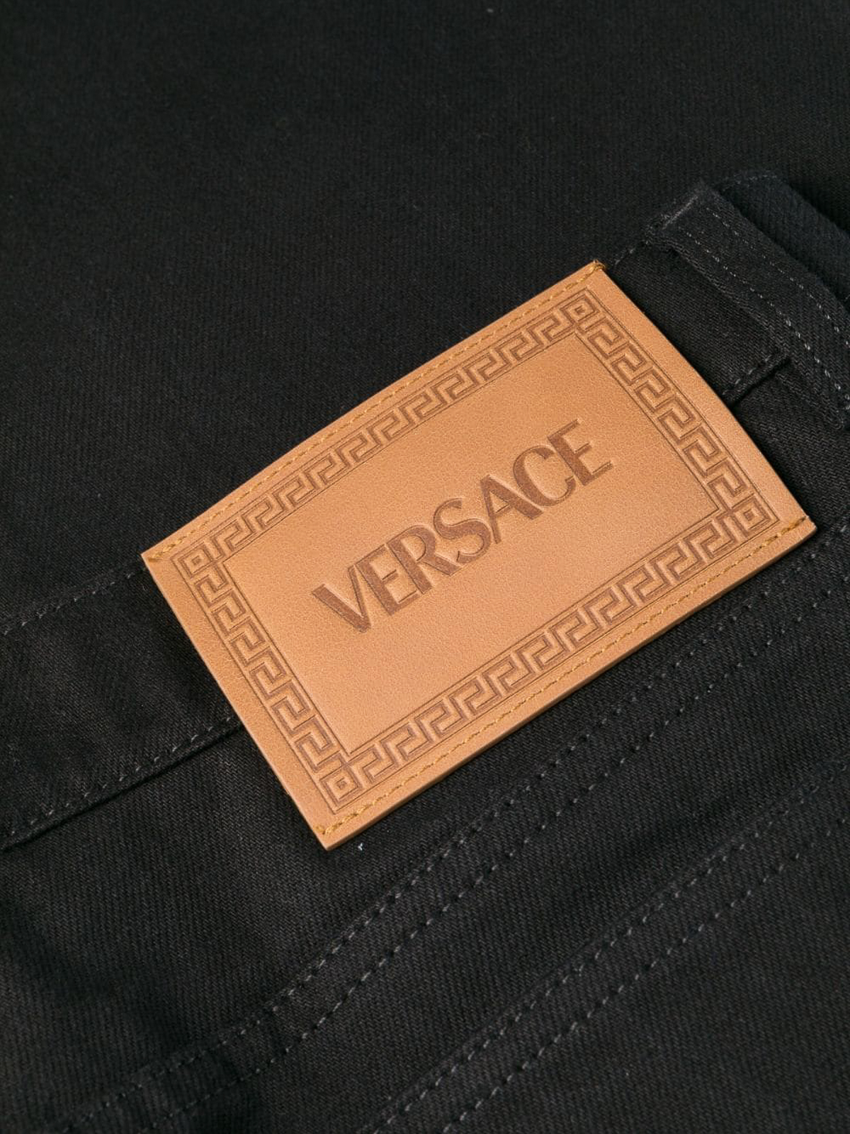 Shop Versace Denim Jeans In Negro