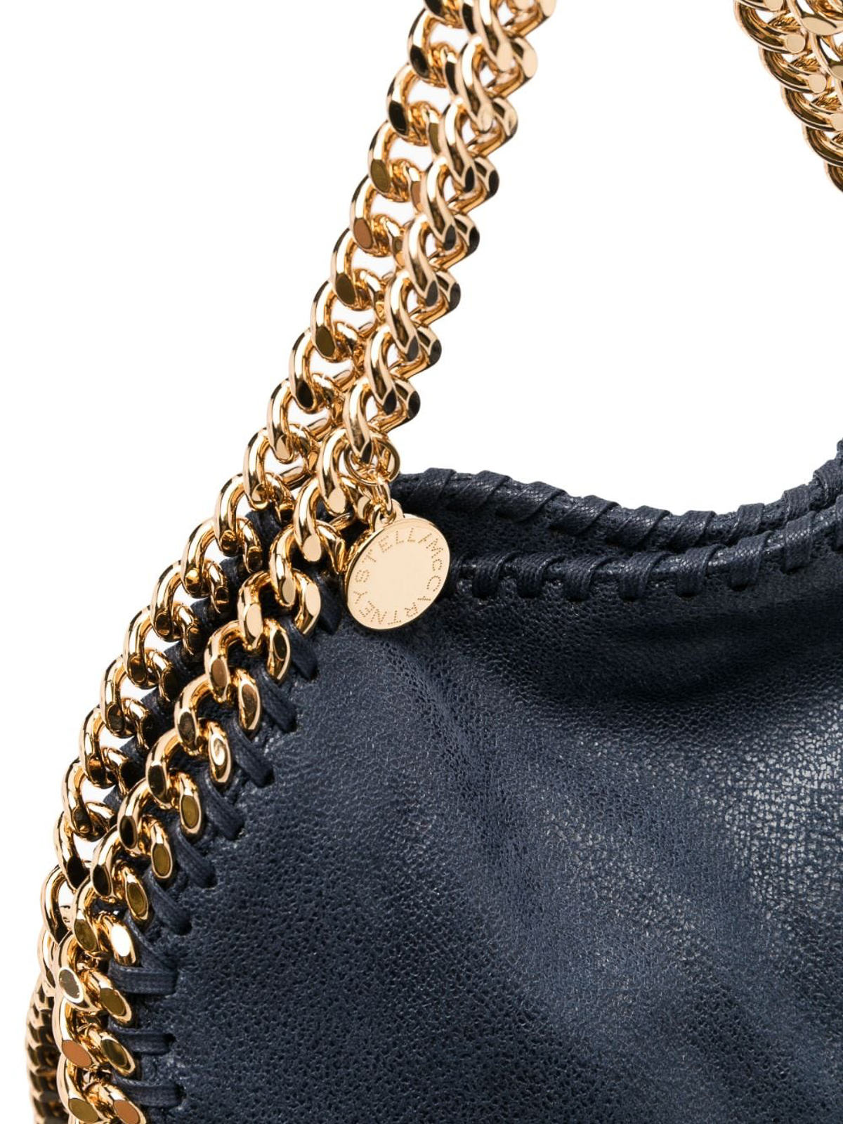 Tory Burch on X: The perfect bucket bag for summer in indigo