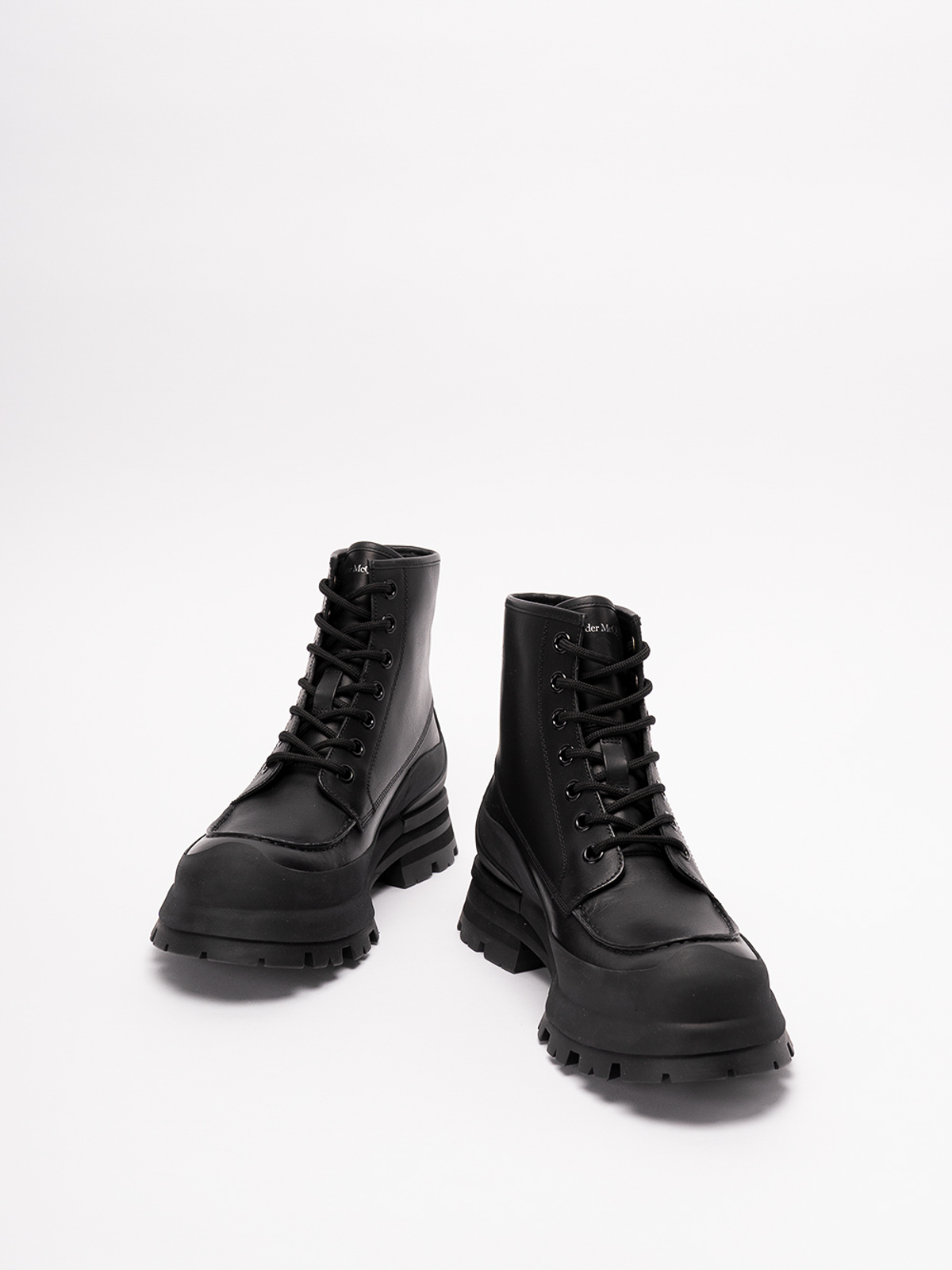 Shop Alexander Mcqueen Leather Ankle Boots In Negro