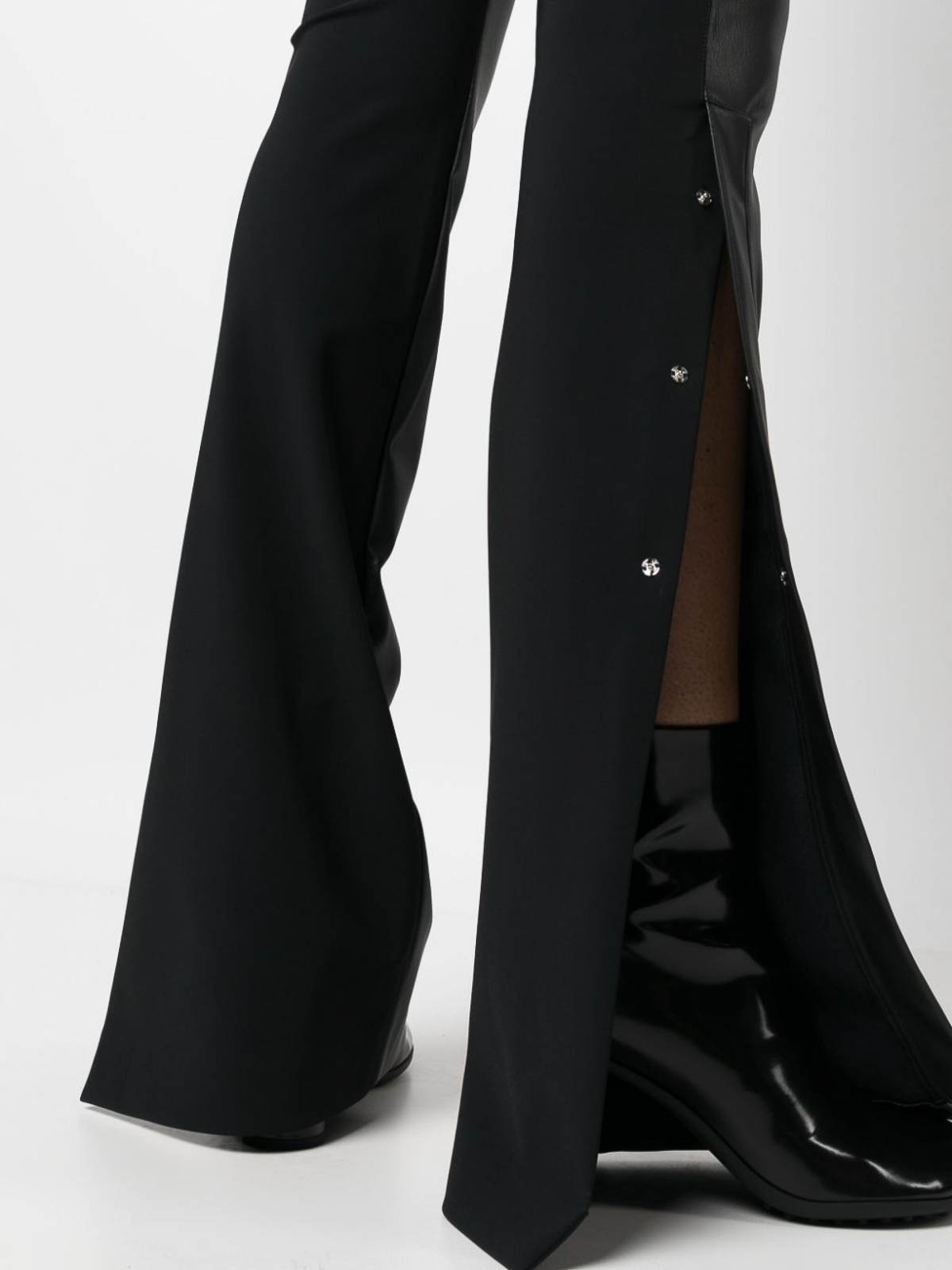 Shop Coperni Flared Panelled Trousers In Negro