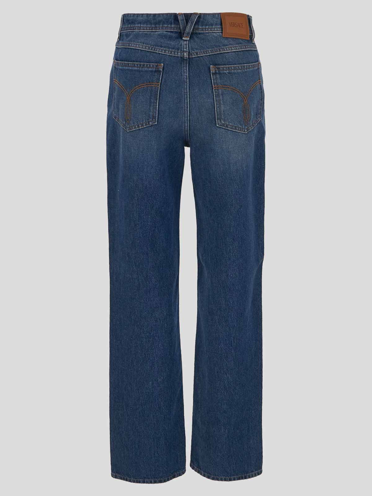 Shop Versace Boootcut Jeans In Blue