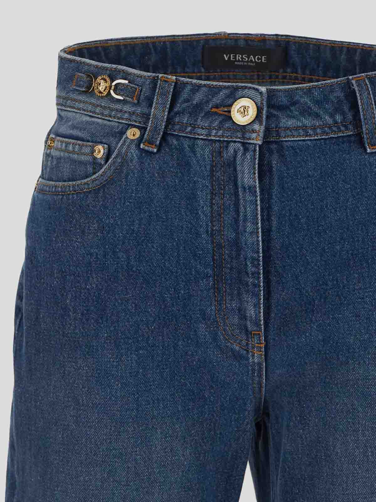 Shop Versace Boootcut Jeans In Blue