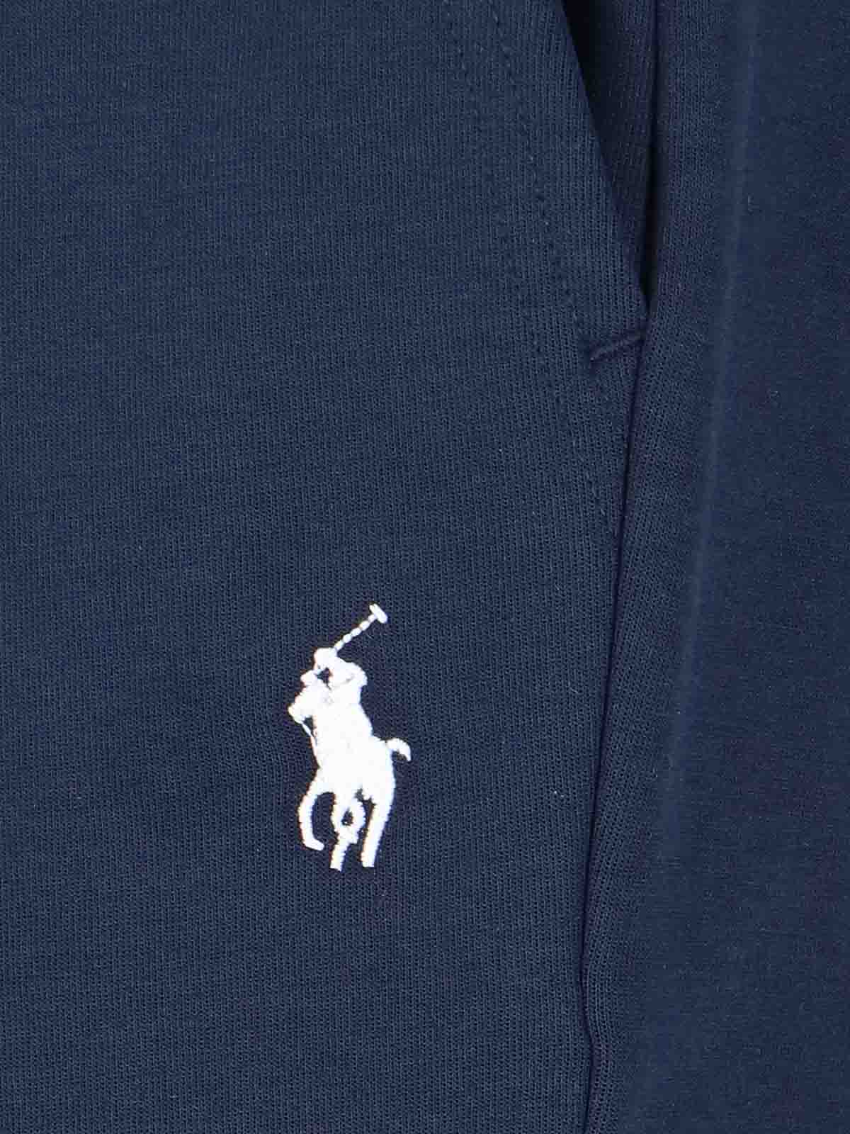 Shop Polo Ralph Lauren Logo Track Pants In Blue