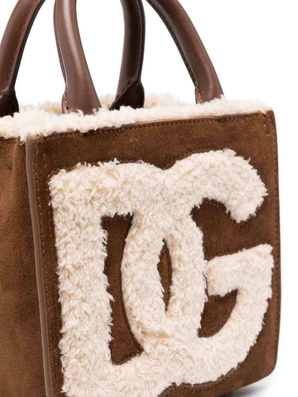 Cross body bags Dolce & Gabbana - Dg logo shearling mini bag