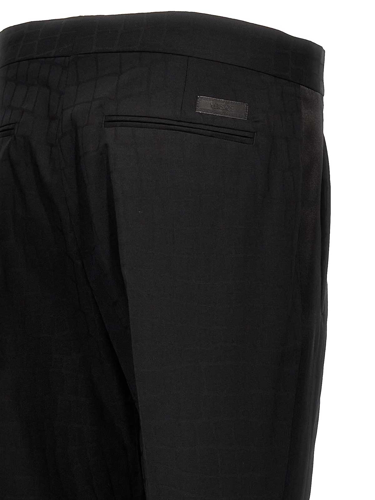 Shop Versace Croc Jacquard Trousers In Negro