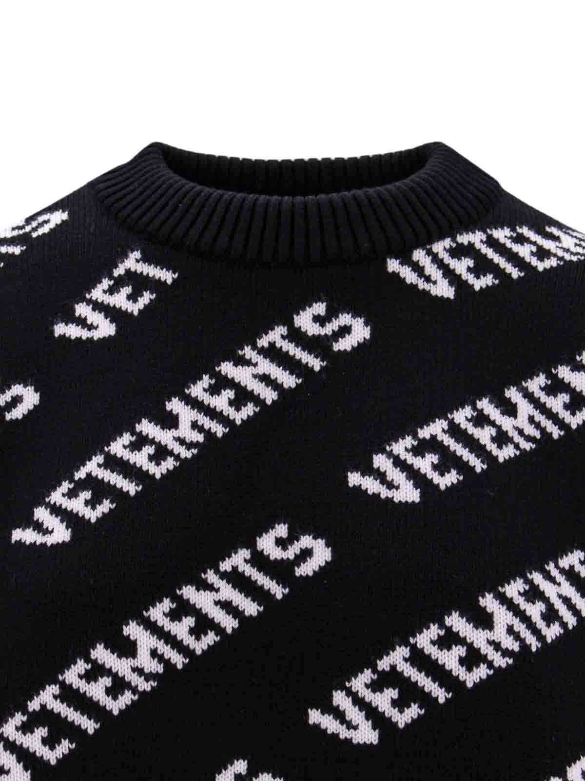 Shop Vetements Merino Wool Sweater With All-over Logo In Black