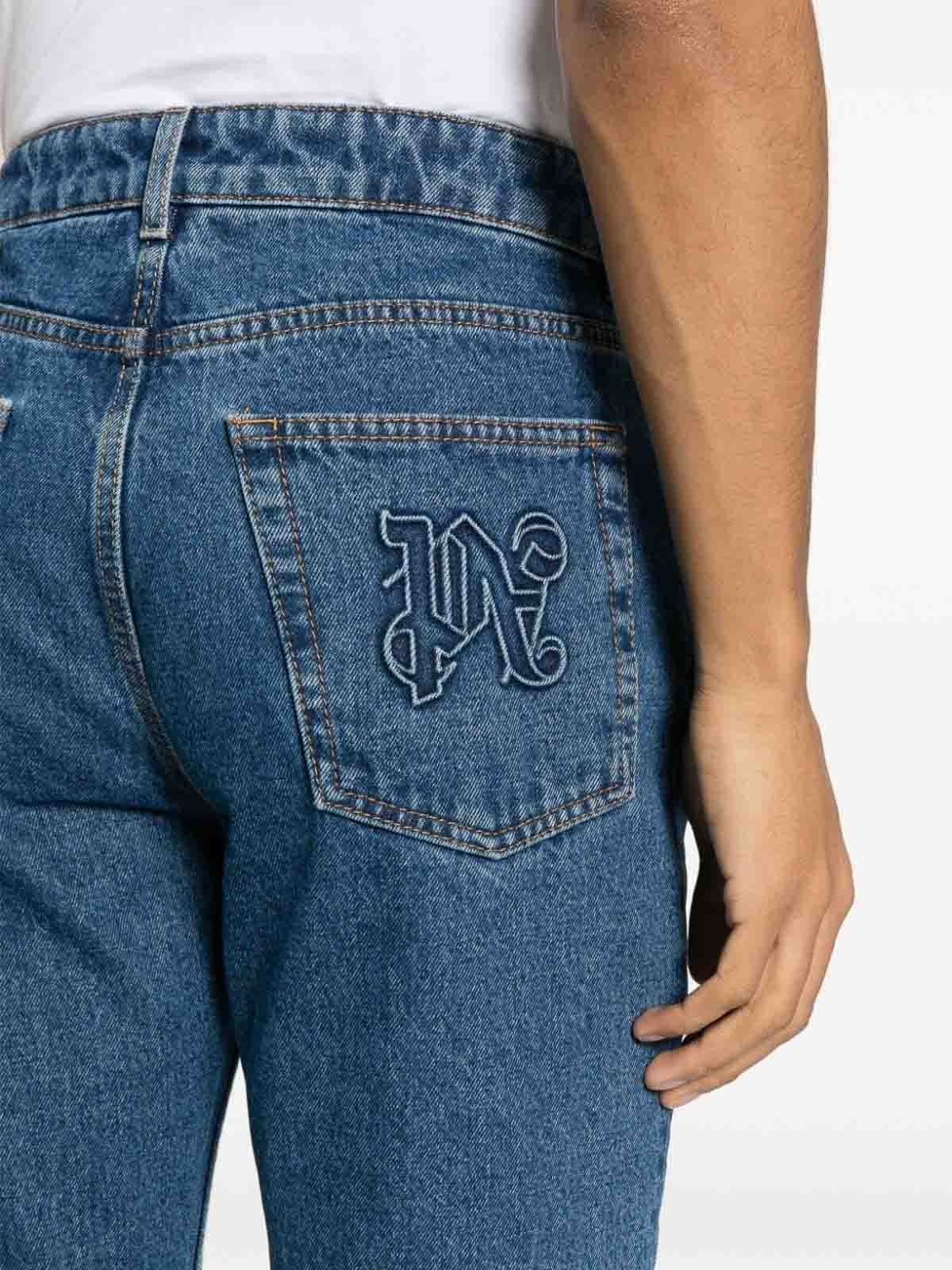 Shop Palm Angels Monogram-embossed Straight-leg Jeans In Light Wash