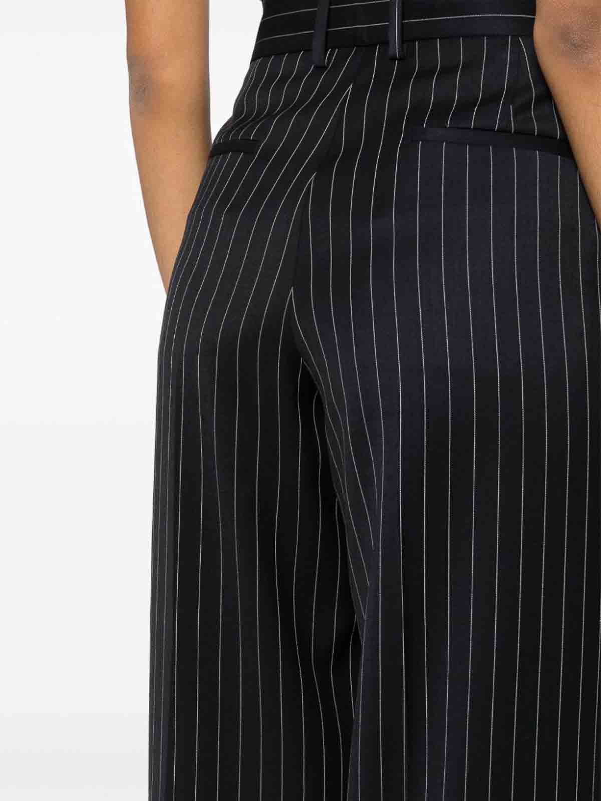 Shop Msgm Pinstripe Pattern Trousers In Blue