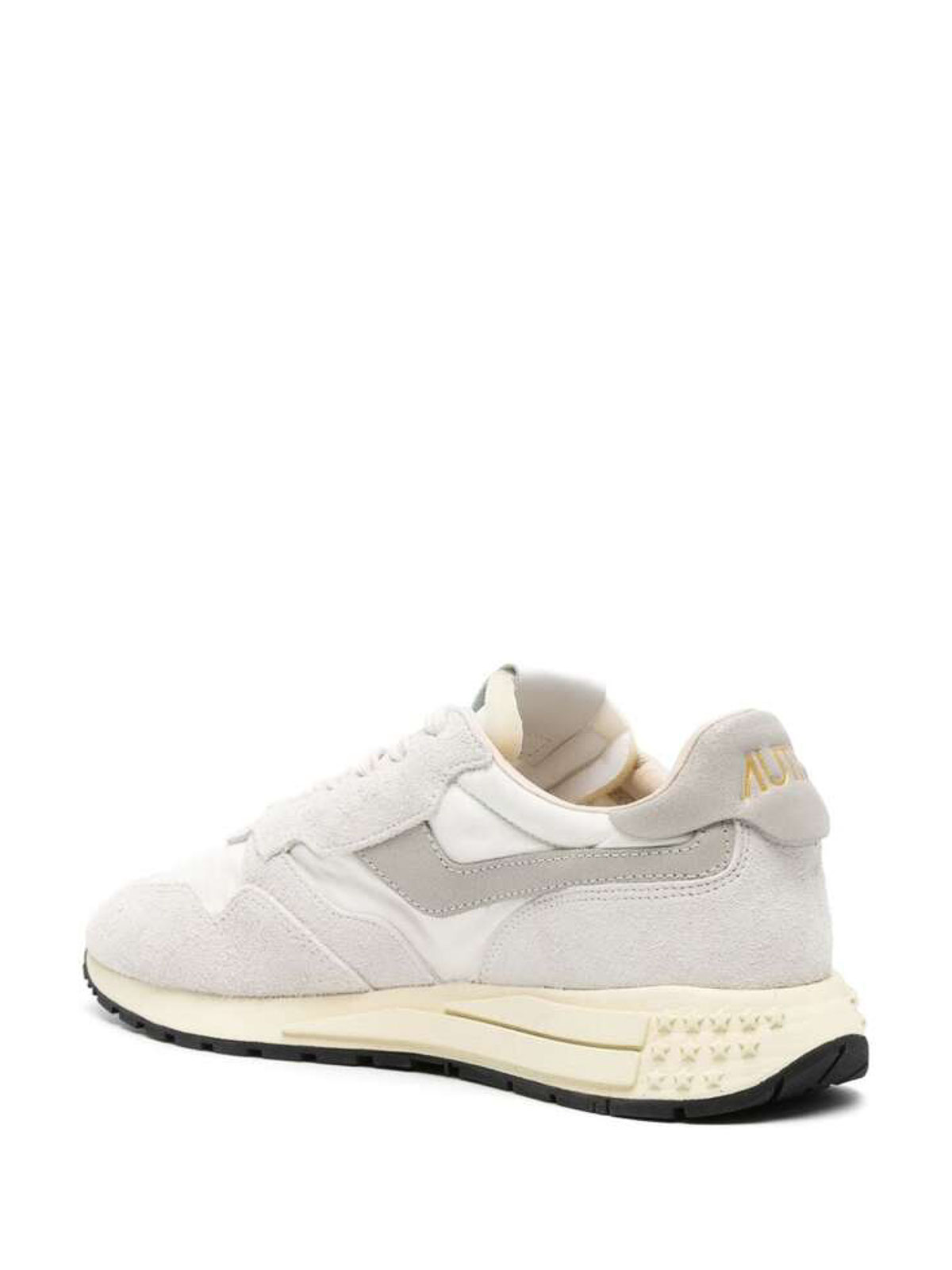 Shop Autry Pannelled Sneakers In White
