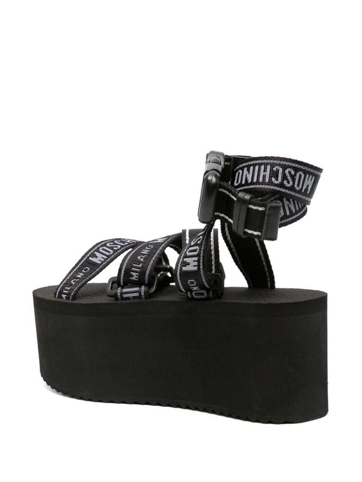 Shop Moschino Logo-print Embossed Logo Sandals In Black