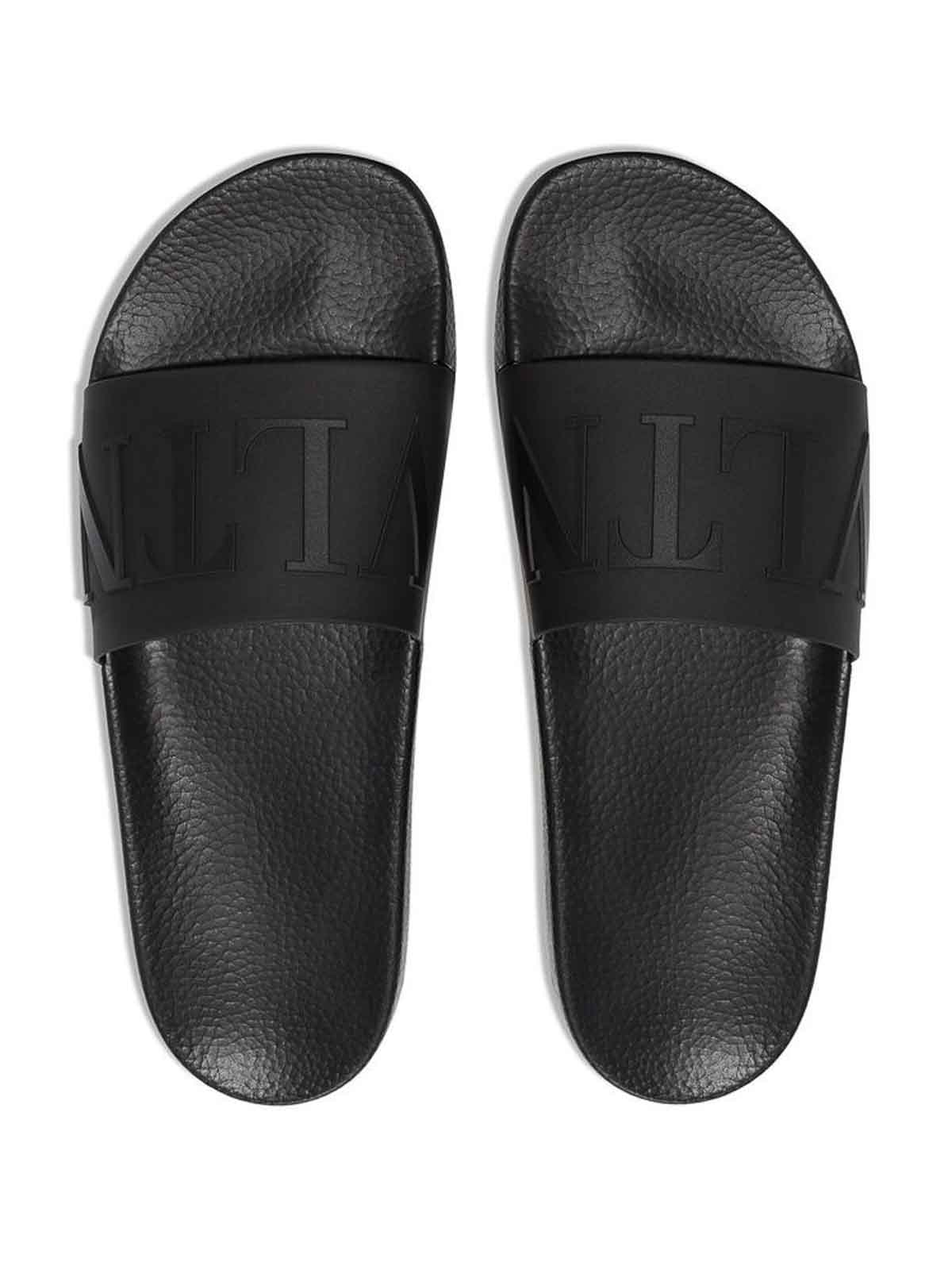 Shop Valentino Logo Sandals In Black