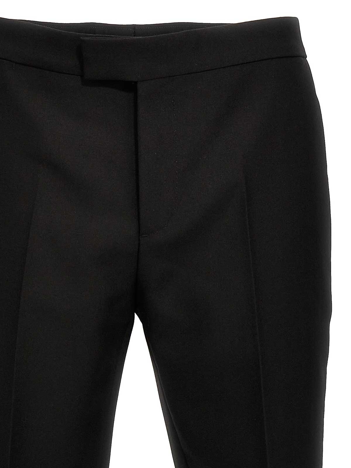 Shop Versace Pantalones De Sastrería - Negro In Black