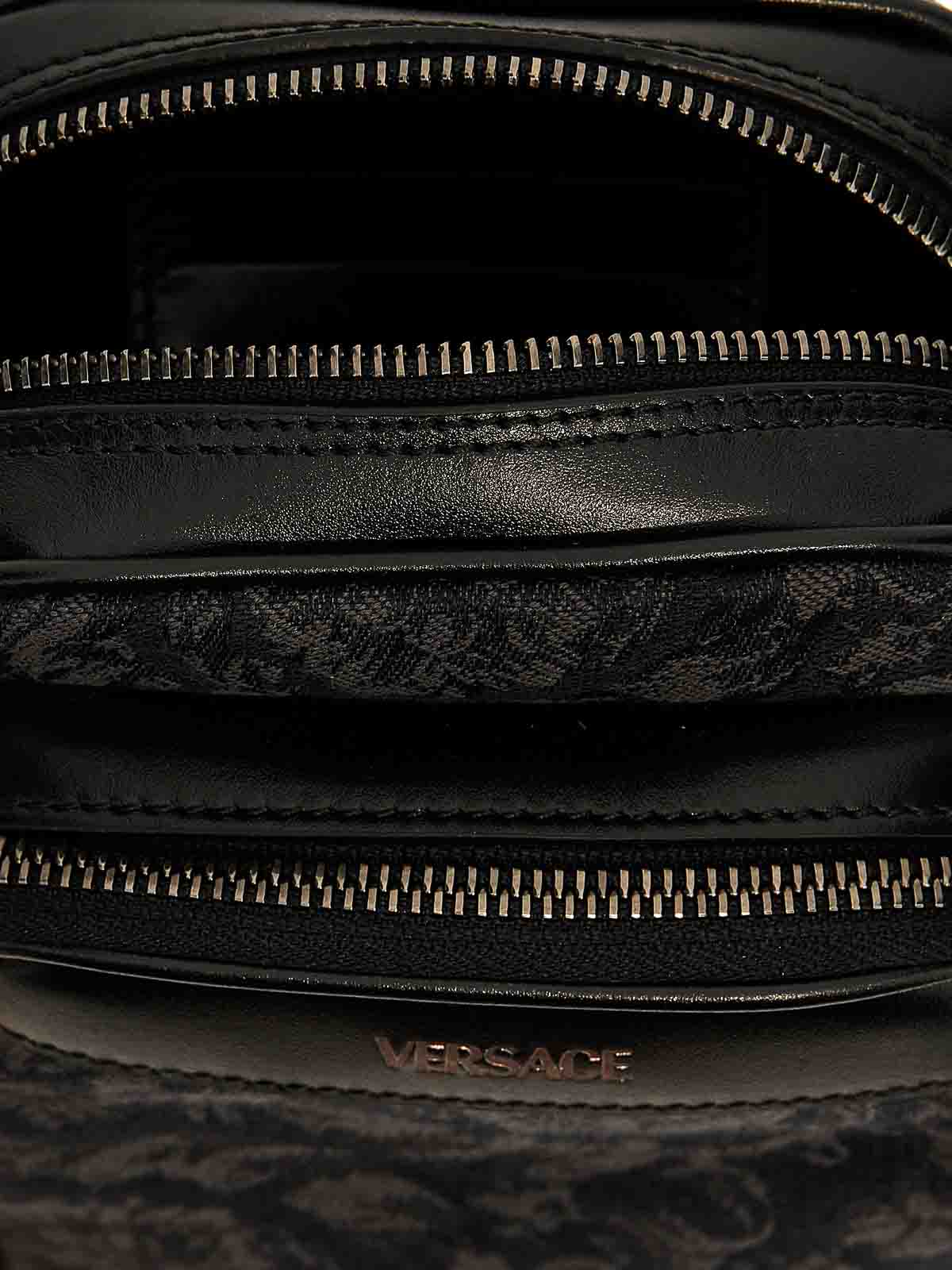 Shop Versace Athena Barocco Crossbody Bag In Black