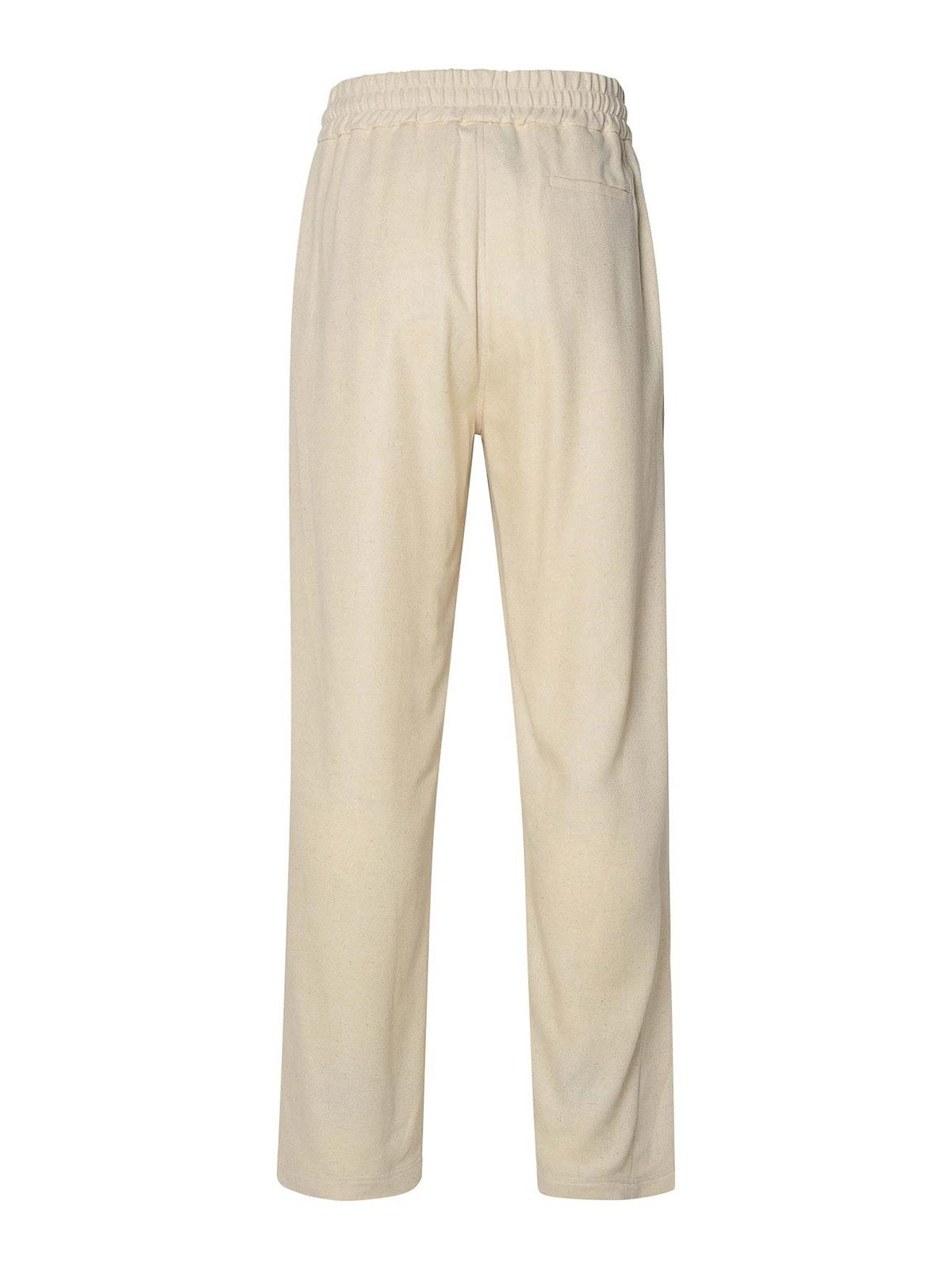 Shop Gcds Ivory Linen Blend Trousers In Cream