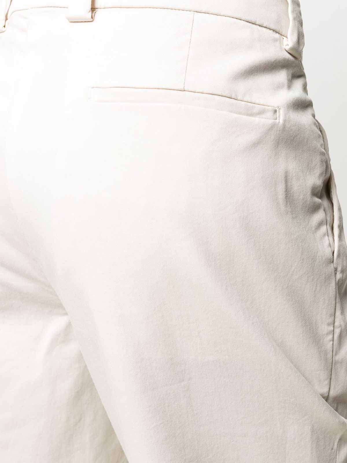 Shop Brunello Cucinelli Chino Pants In Cream