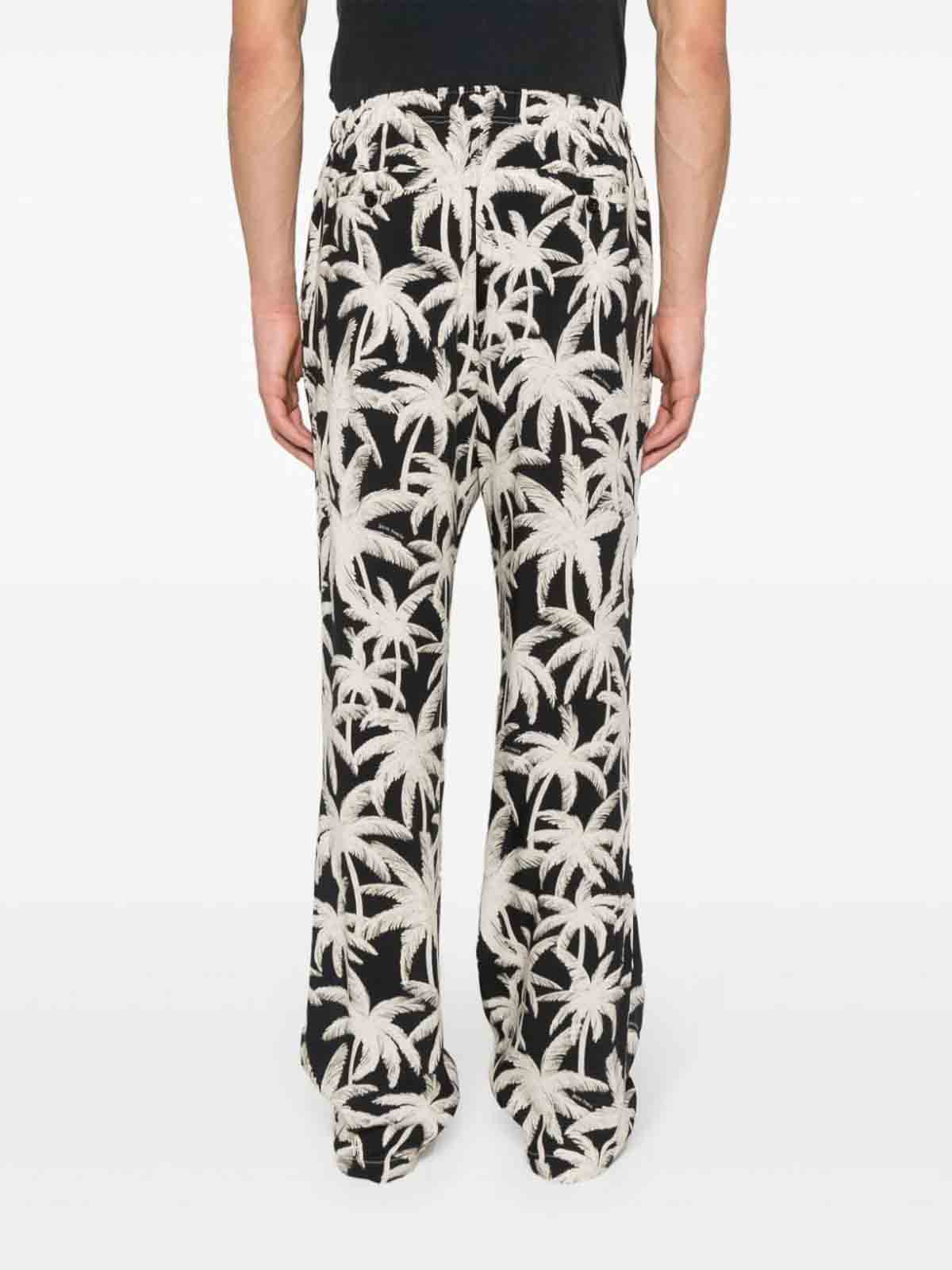Shop Palm Angels Allover Logo Loose Fit Trousers In Negro