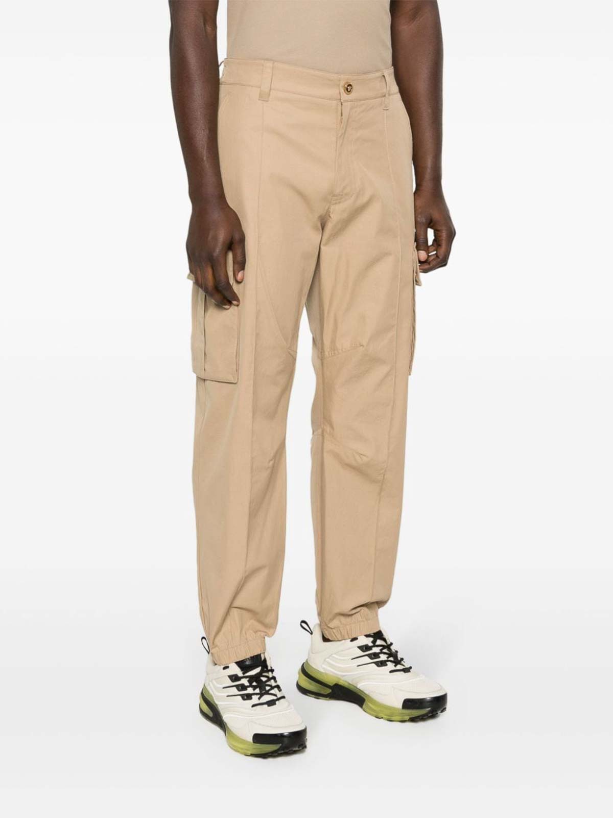 Shop Versace Cotton Cargo Trousers In Beis