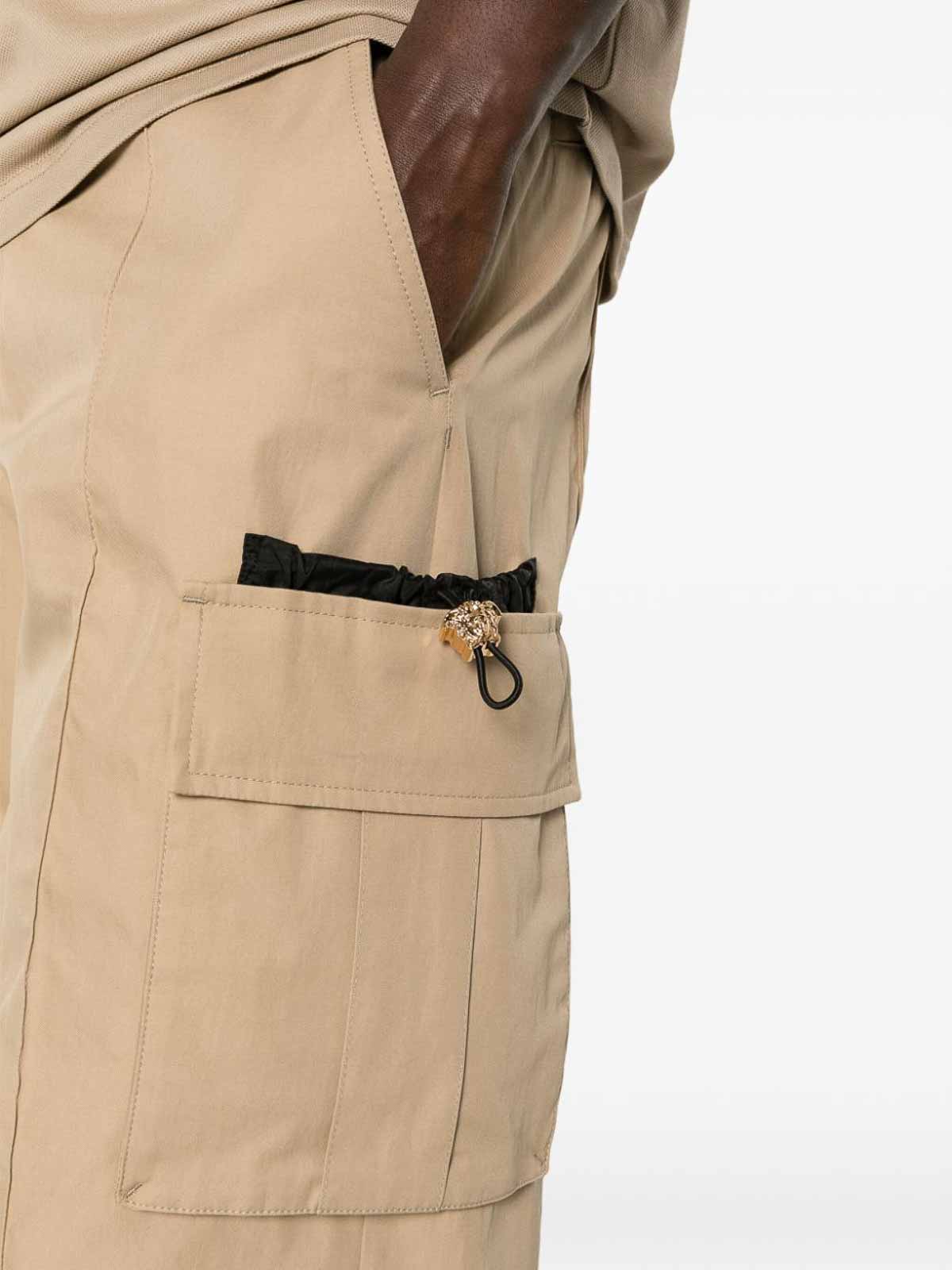Shop Versace Cotton Cargo Trousers In Beis