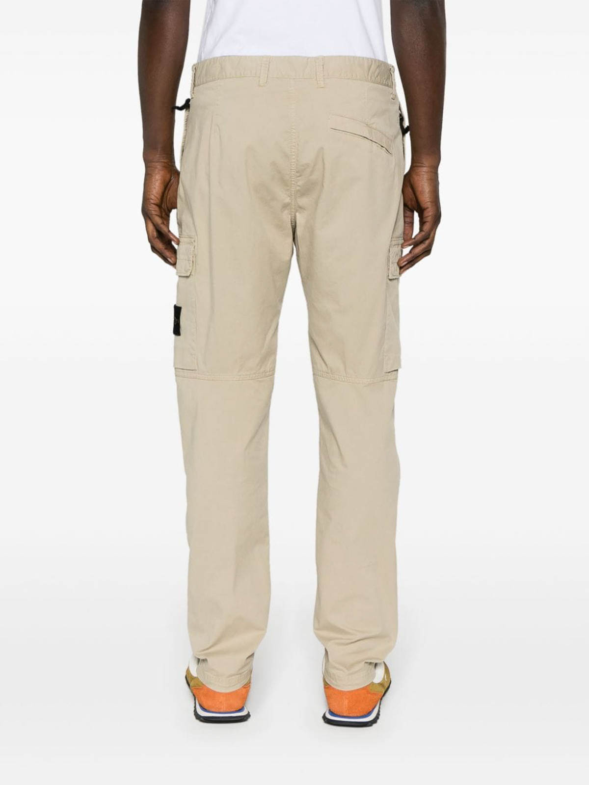 Shop Stone Island Trousers With Patch In Beige