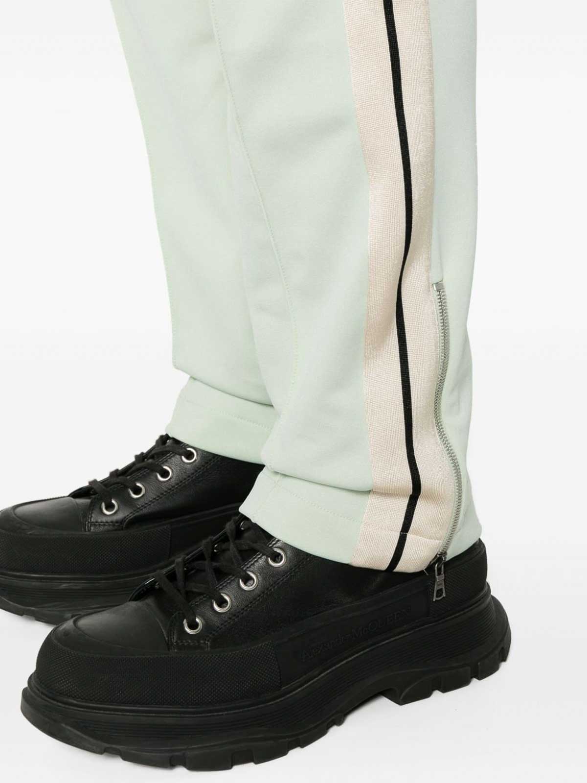 Shop Palm Angels Stripe Detail Trousers In Green
