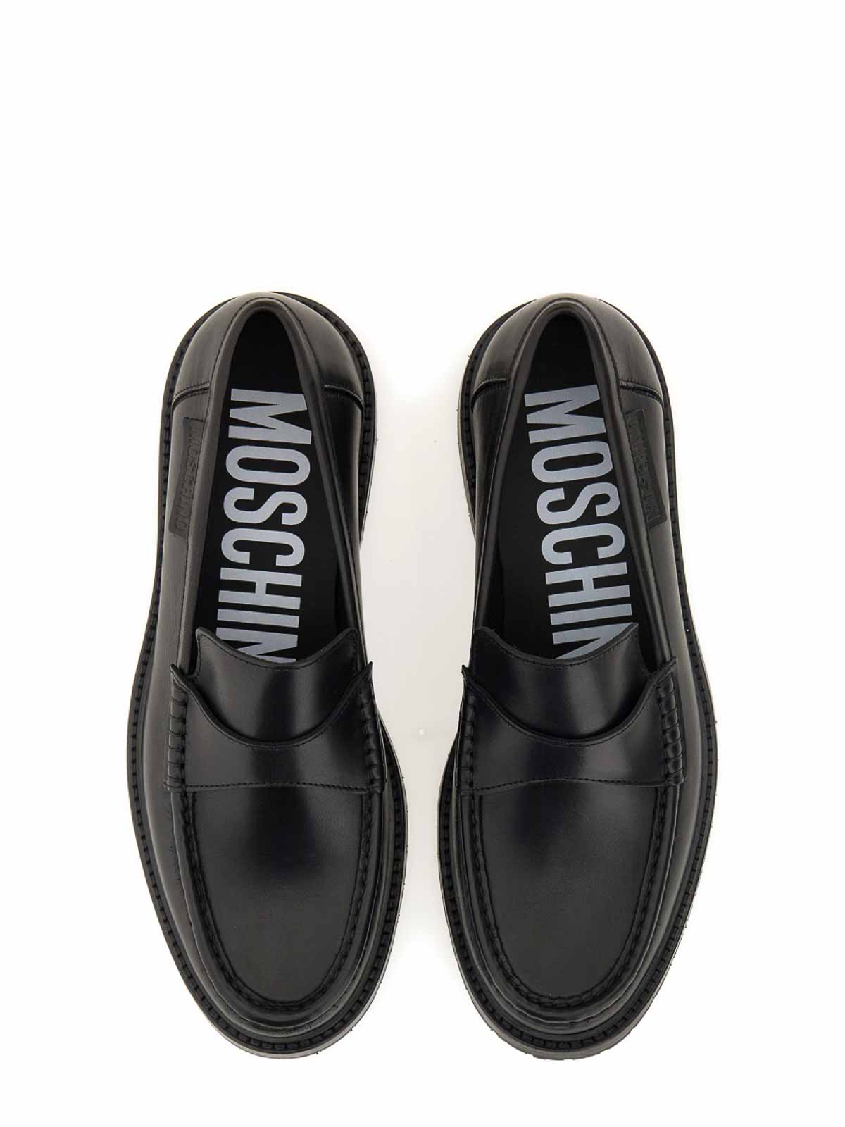Shop Moschino Leather Loafer In Black