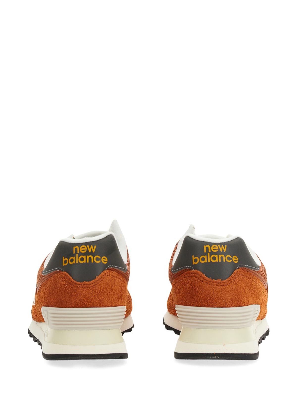 Shop New Balance Sneakers 574 In Orange
