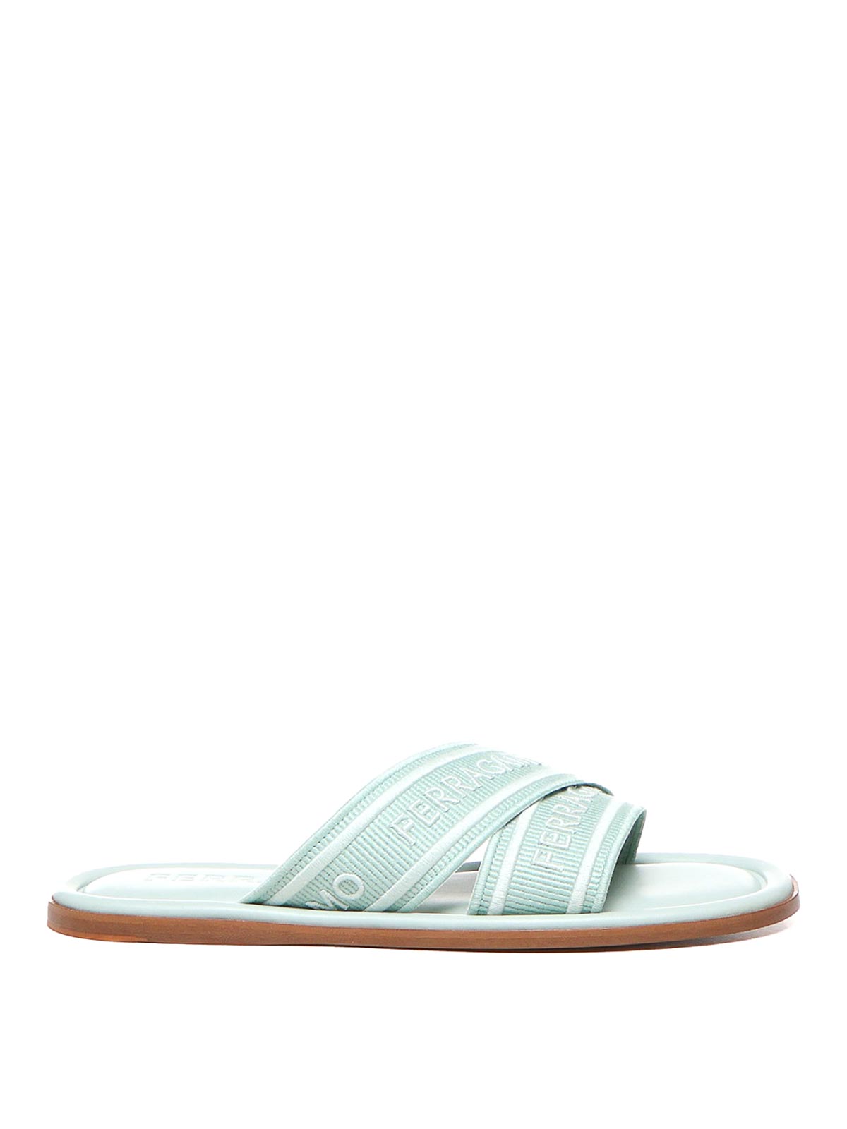 Shop Ferragamo Round Toe Slide Sandals With Logo In Verde Claro