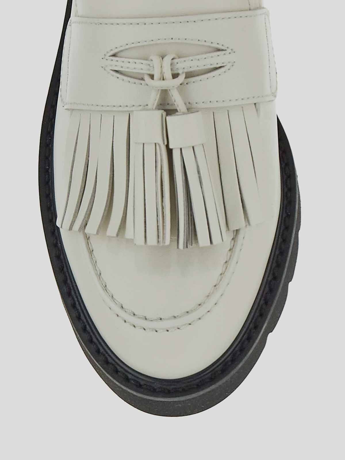 Shop Stuart Weitzman Fringes Loafers In White
