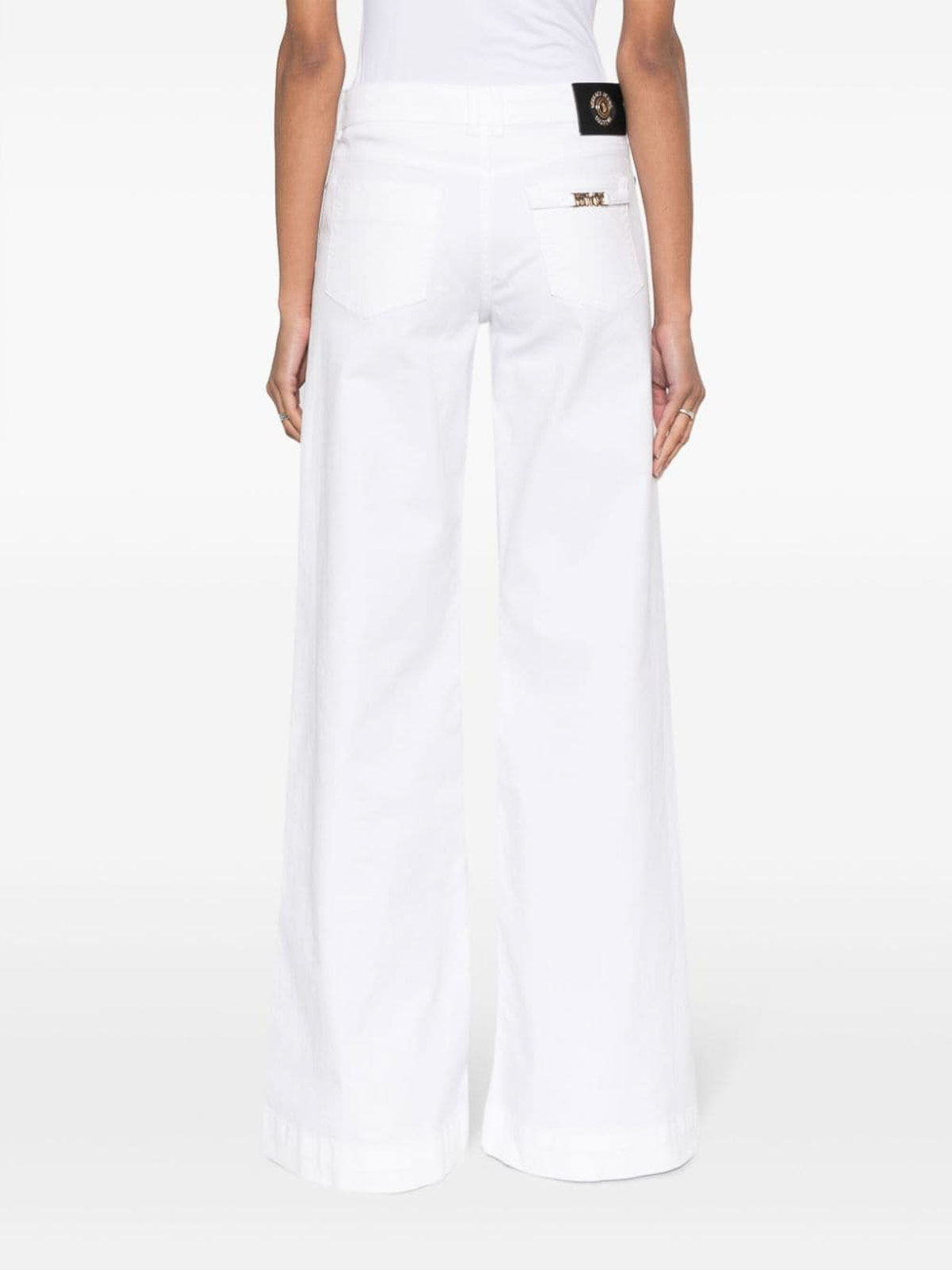 Shop Versace Jeans Couture Wide Leg Jeans In White