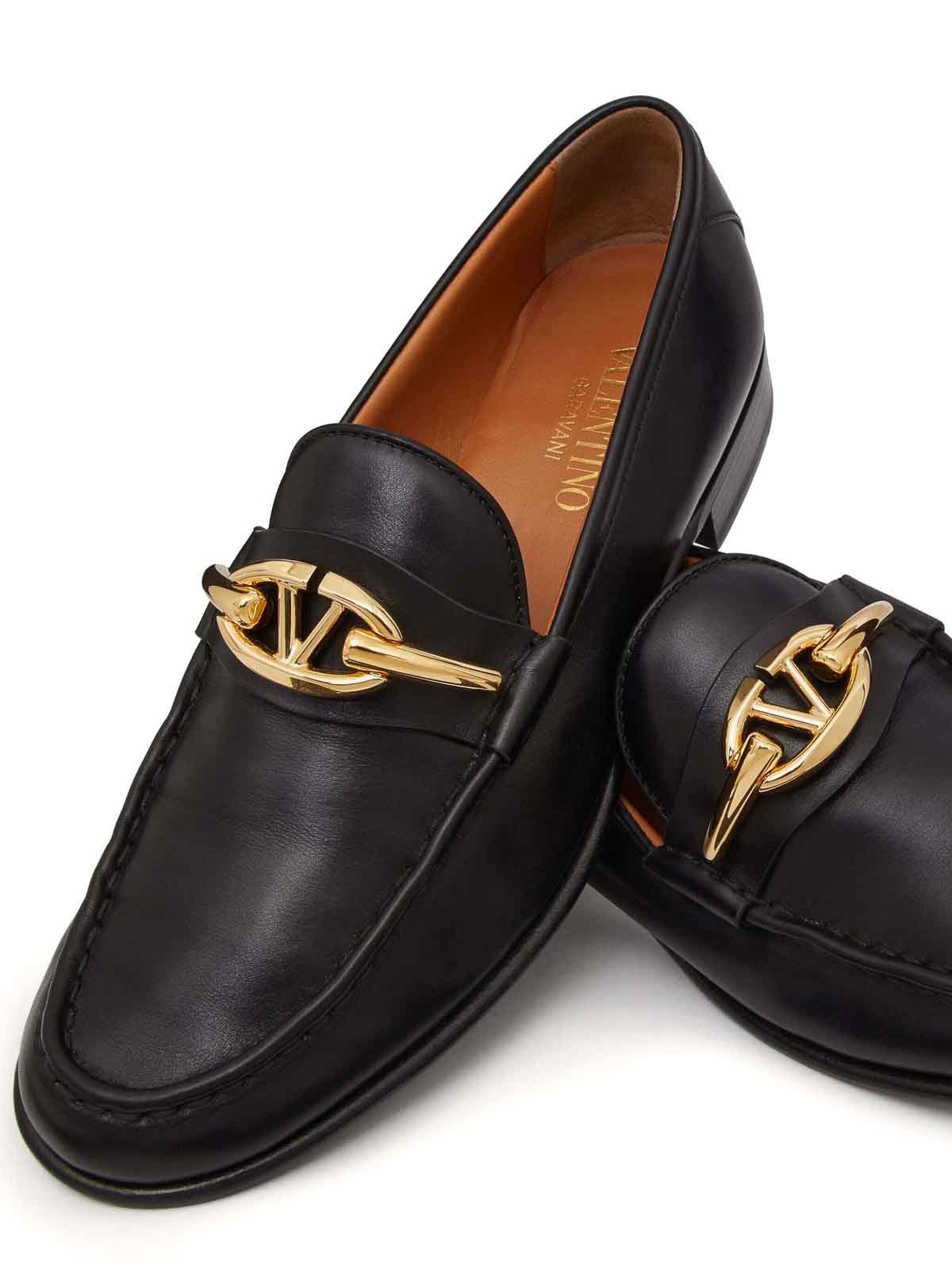 Shop Valentino Signature Loafers In Black