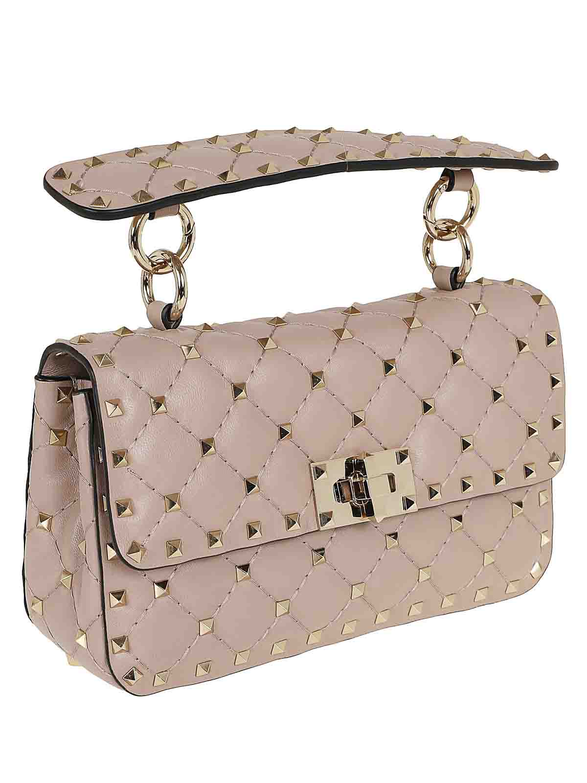 Shop Valentino Small Rockstud Spike Bag In Nude & Neutrals