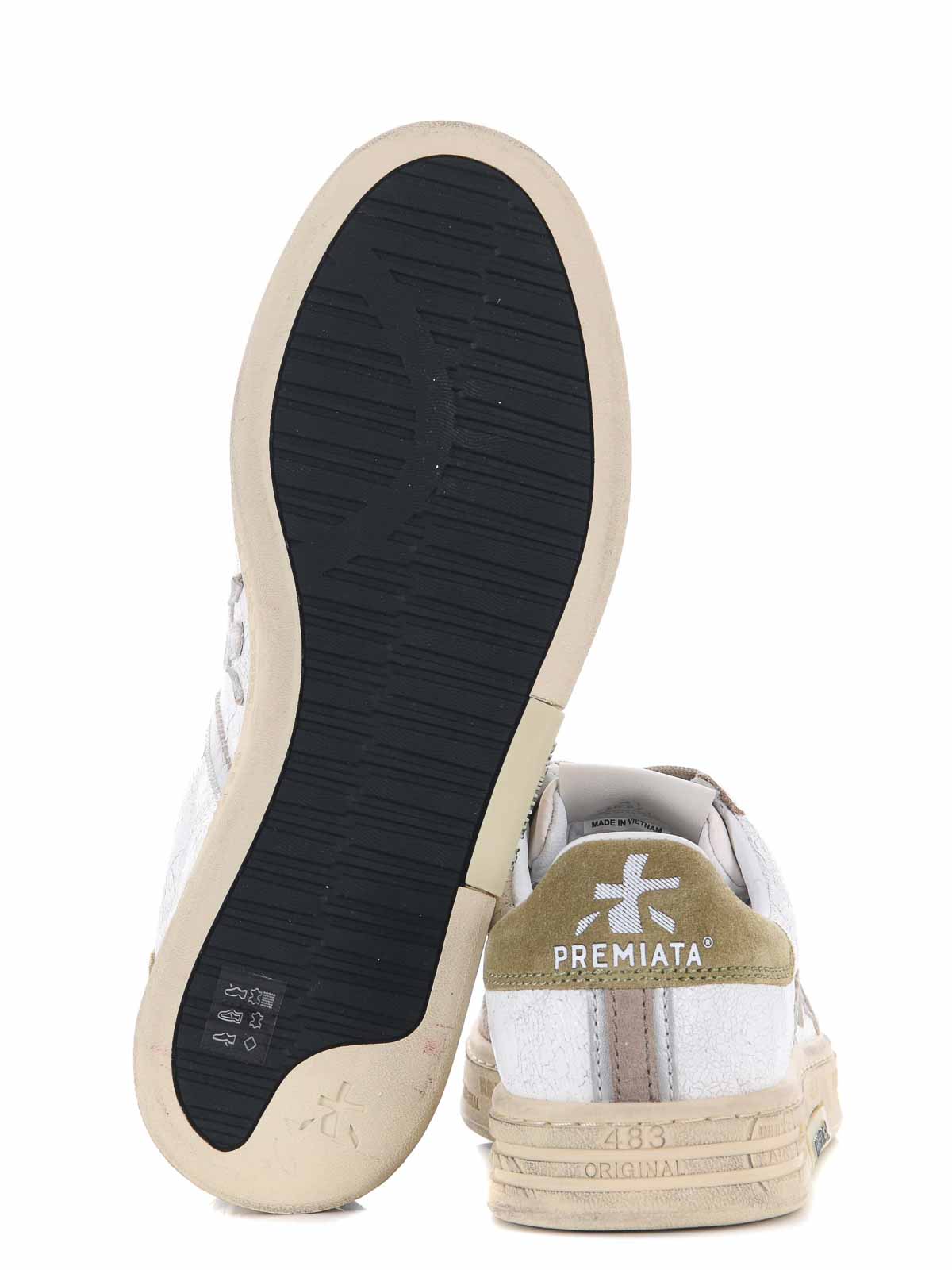 Shop Premiata Sneakers In White