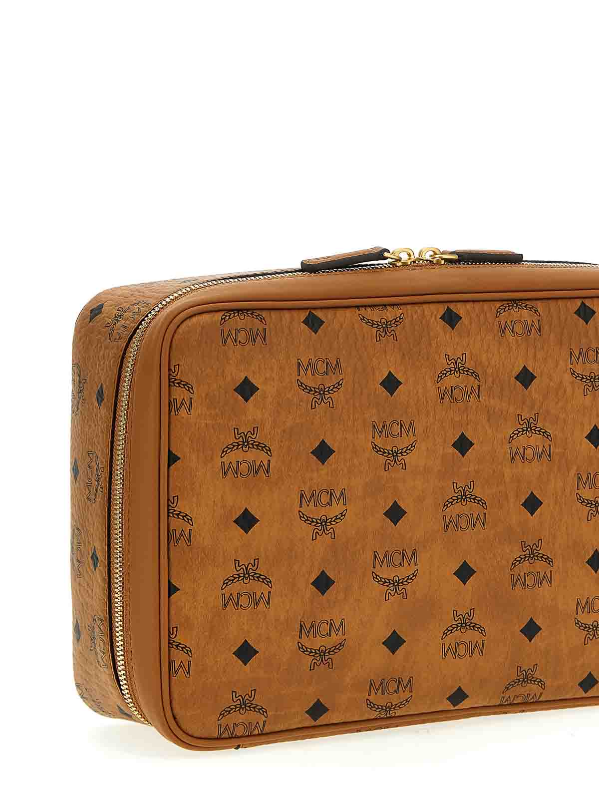 Shop Mcm Ottomar Travel Case Clutch In Brown