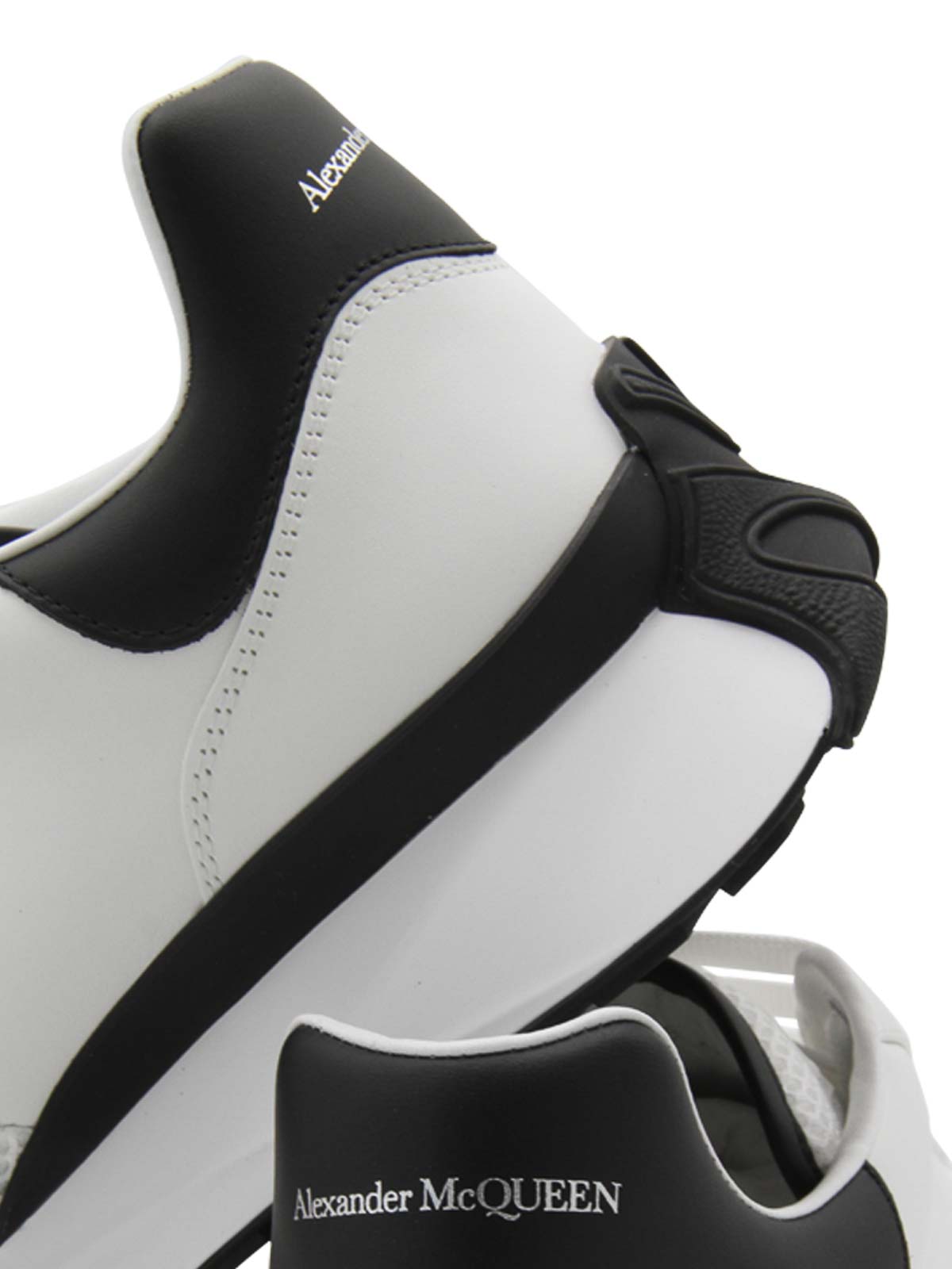 Shop Alexander Mcqueen White And Black Leather Sneakers