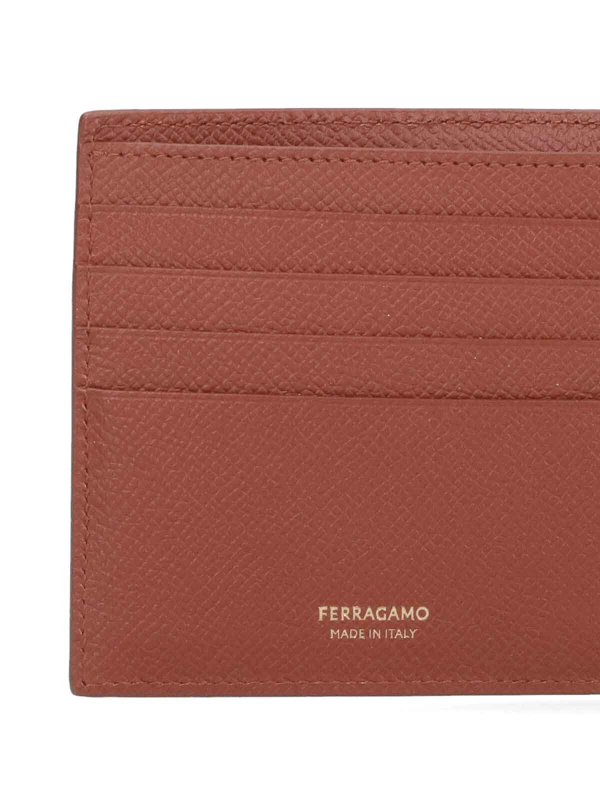 Shop Ferragamo Bi-fold Wallet In Brown