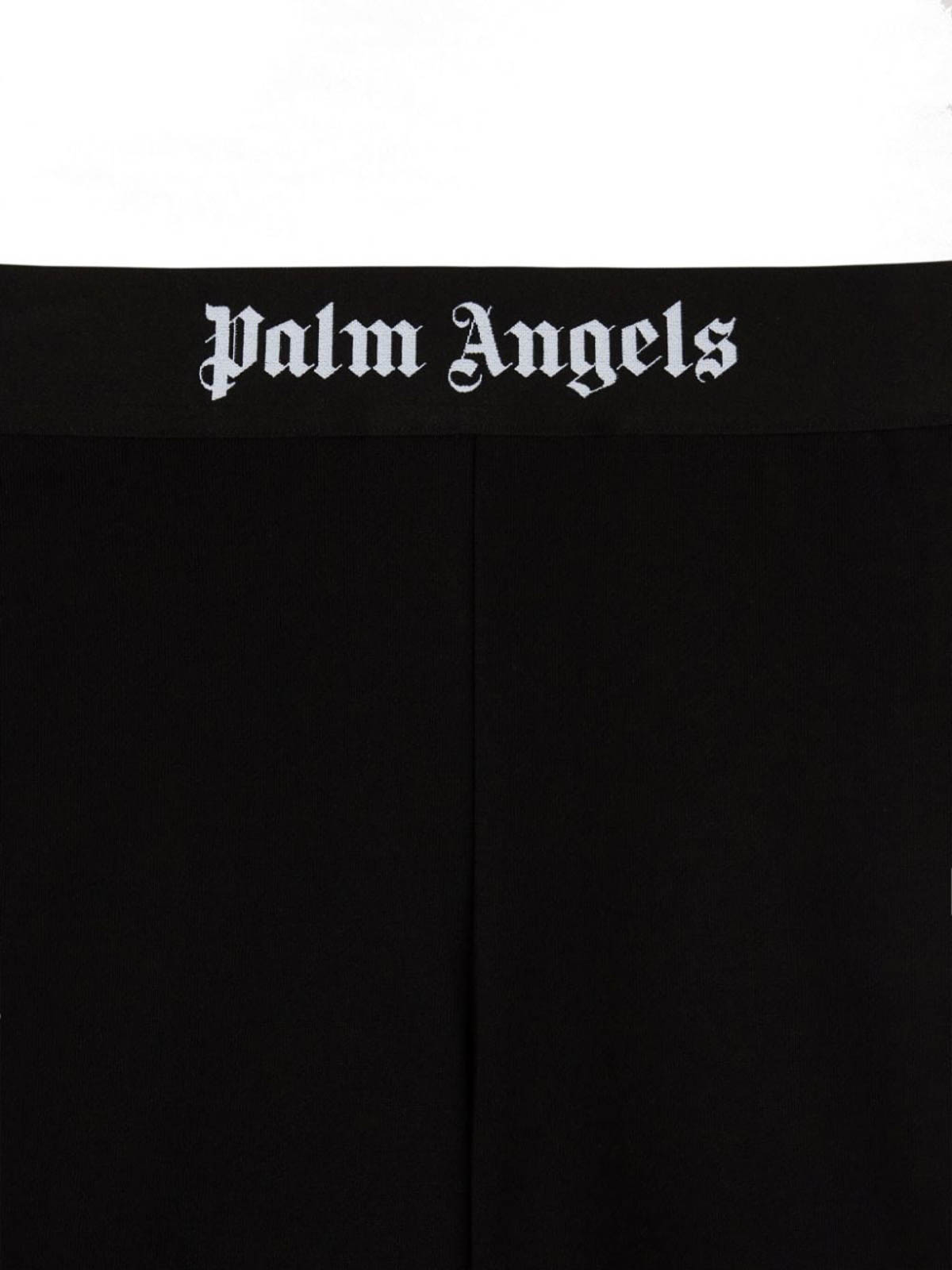 Shop Palm Angels Flared Jeans In Black